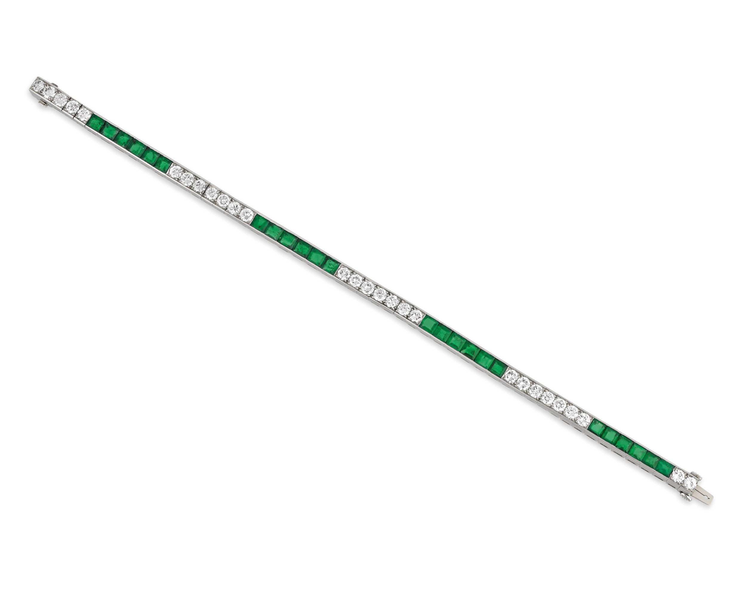 This sleek and elegant line bracelet from Tiffany & Co. features approximately 3.25 carats of emeralds accented by round white diamonds totaling approximately 1.80 carats. For over a century, the name Tiffany & Co. has been synonymous with beauty