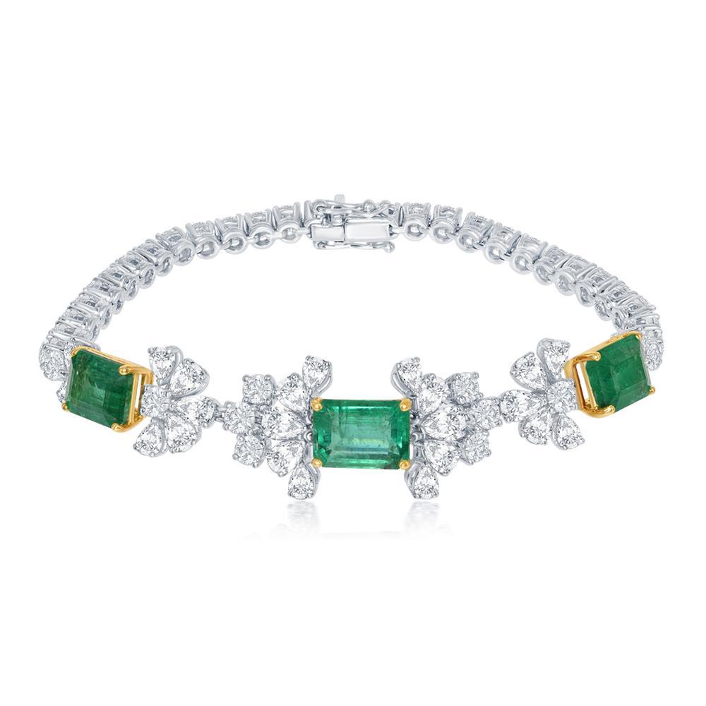 18k White Gold 7.39ct Emerald and 8.18ct Diamond Bracelet

Perfectly matched Zambian emeralds offer pops of color across a lacy
diamond bracelet.
Item: # 03040
Metal: 18k W / Y
Color Weight: 7.39 ct.
Diamond Weight: 8.18 ct.