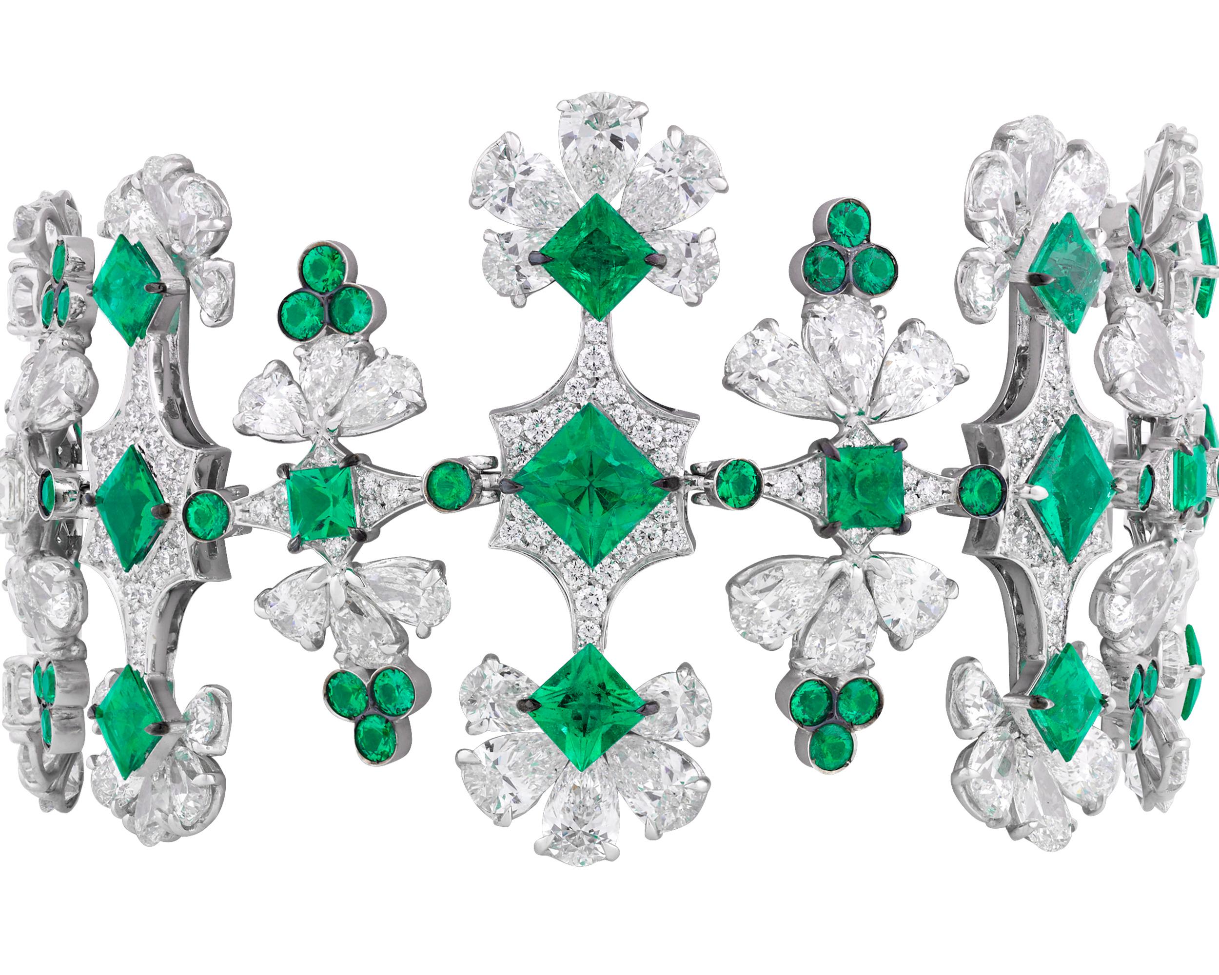 An array of round and pear-shaped diamonds are joined by verdant emeralds in this one-of-a-kind Italian bracelet. The highly unique design incorporates approximately 41.98 carats of brilliant white diamonds with 13.74 total carats of emeralds, all
