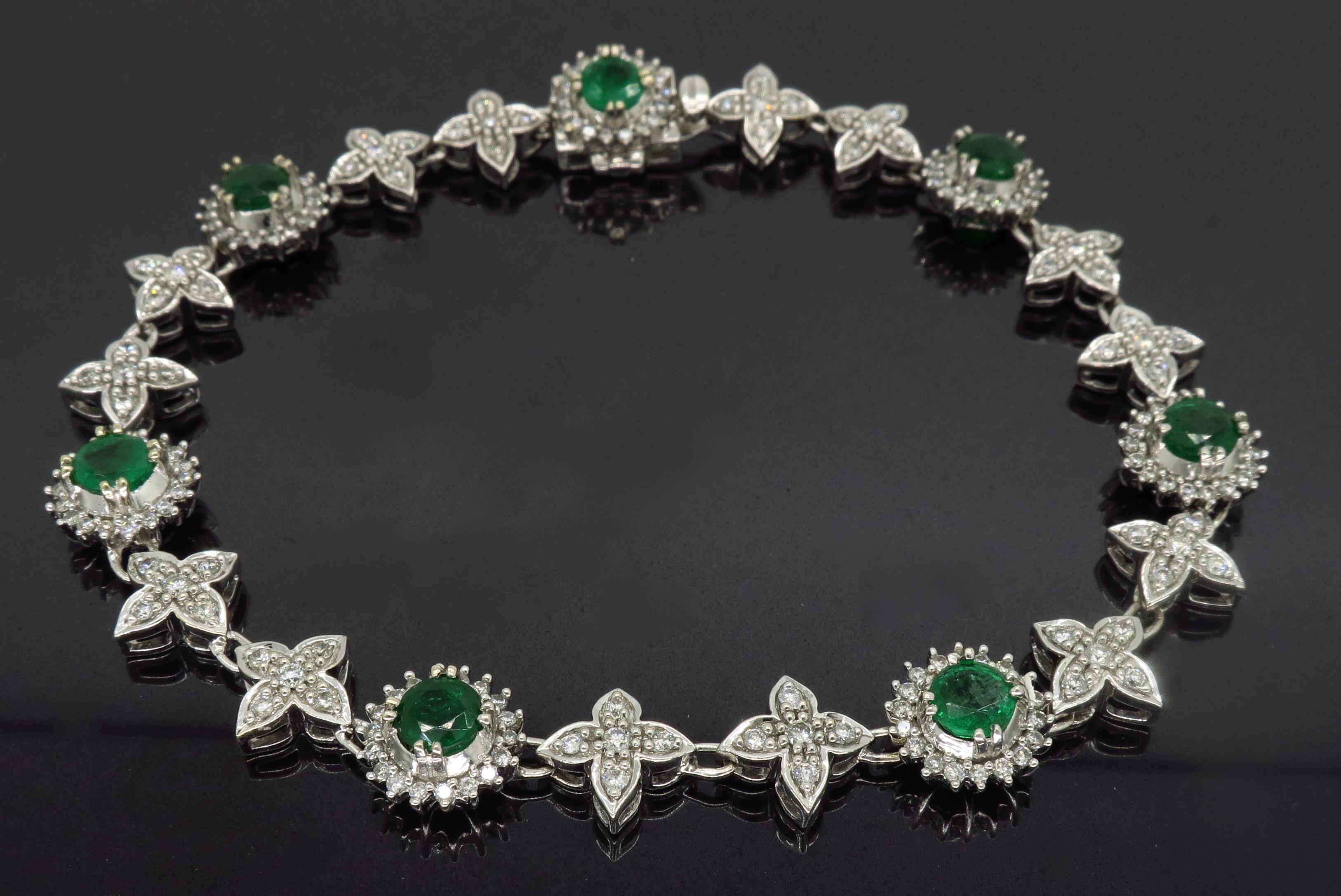 This stunning bracelet features 1.90ctw of round cut emeralds surrounded by approximately 1.20CTW of Round Brilliant Cut Diamonds.

Gemstone: Emerald & Diamond
Gemstone Carat Weight: Approximately 1.90CTW Emerald 
Diamond Cut: Round Brilliant Cut