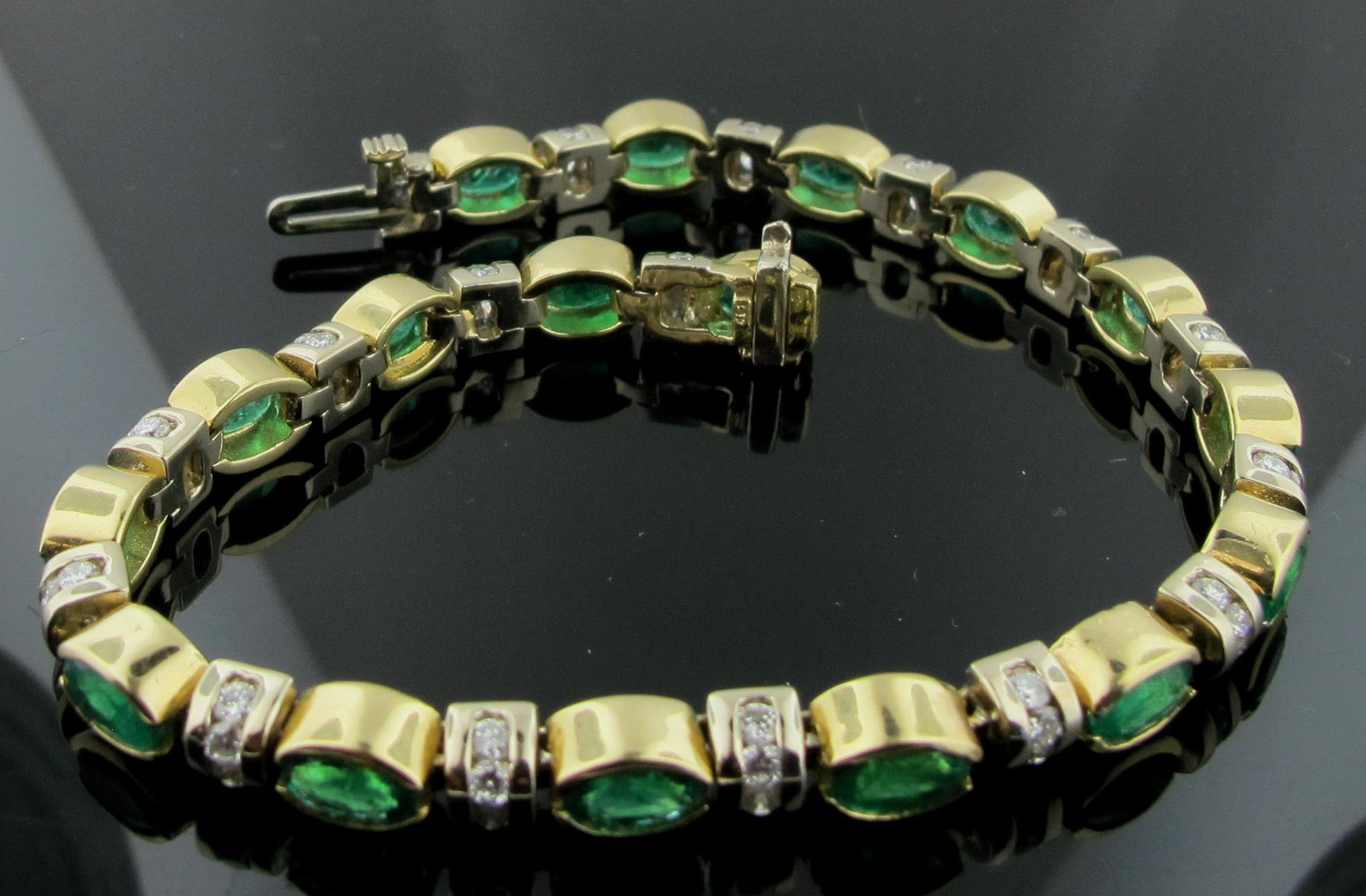Set in 14 karat yellow gold are 17 oval Emeralds weighing a total of 6.75 carats.  Also highlighting the emeralds are 68 round brilliant cut diamonds with a total diamond weight of 2.00 carats.  Color is G, Clarity is VS.  Gold weight is 23 grams. 