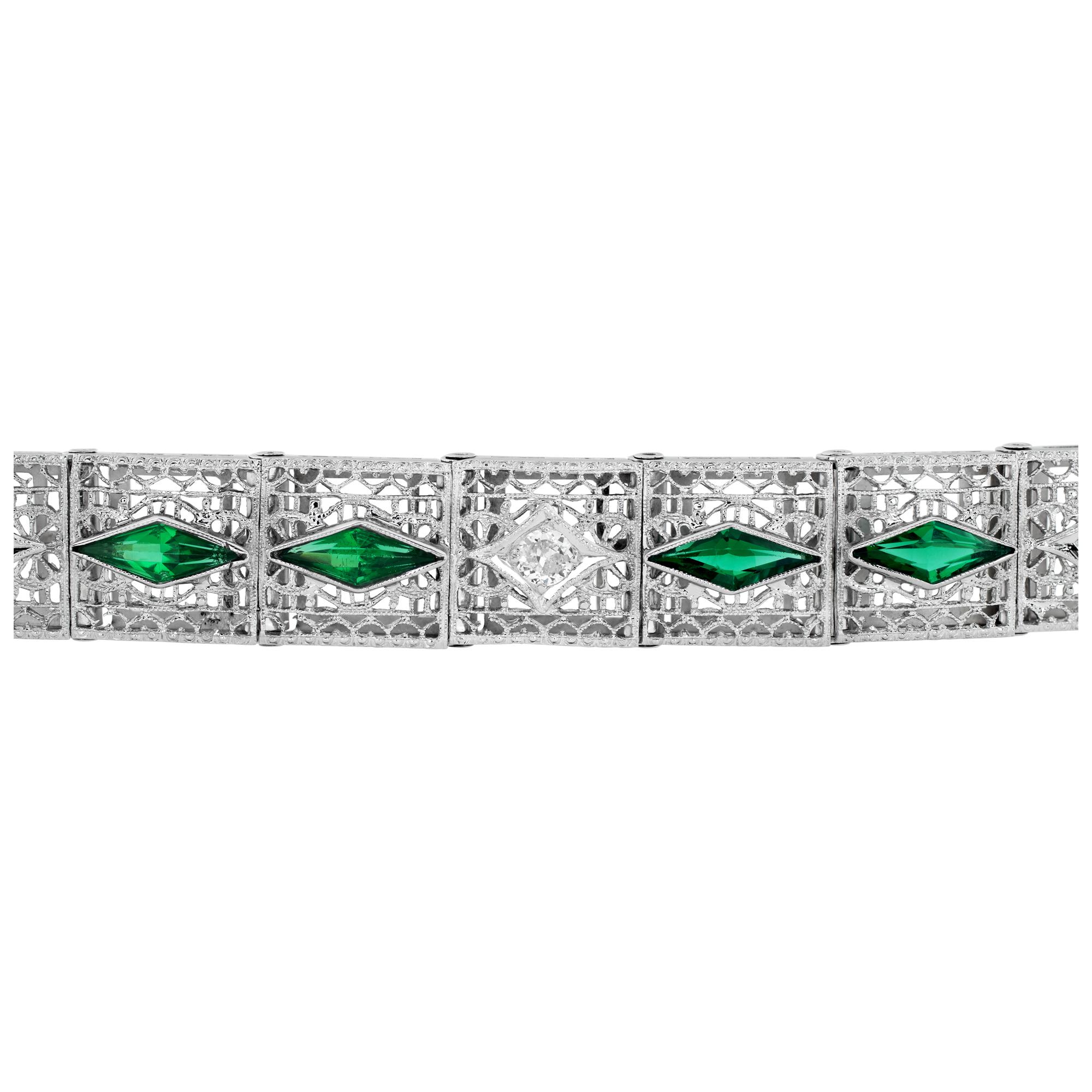 Elegant  line bracelet with synthetic emeralds and diamonds set in filigree 14k white gold, with platinum top. All diamonds are eye clean and whie. 7.75