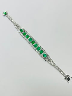 Emerald and Diamond Bracelet In 18 Karat White Gold.