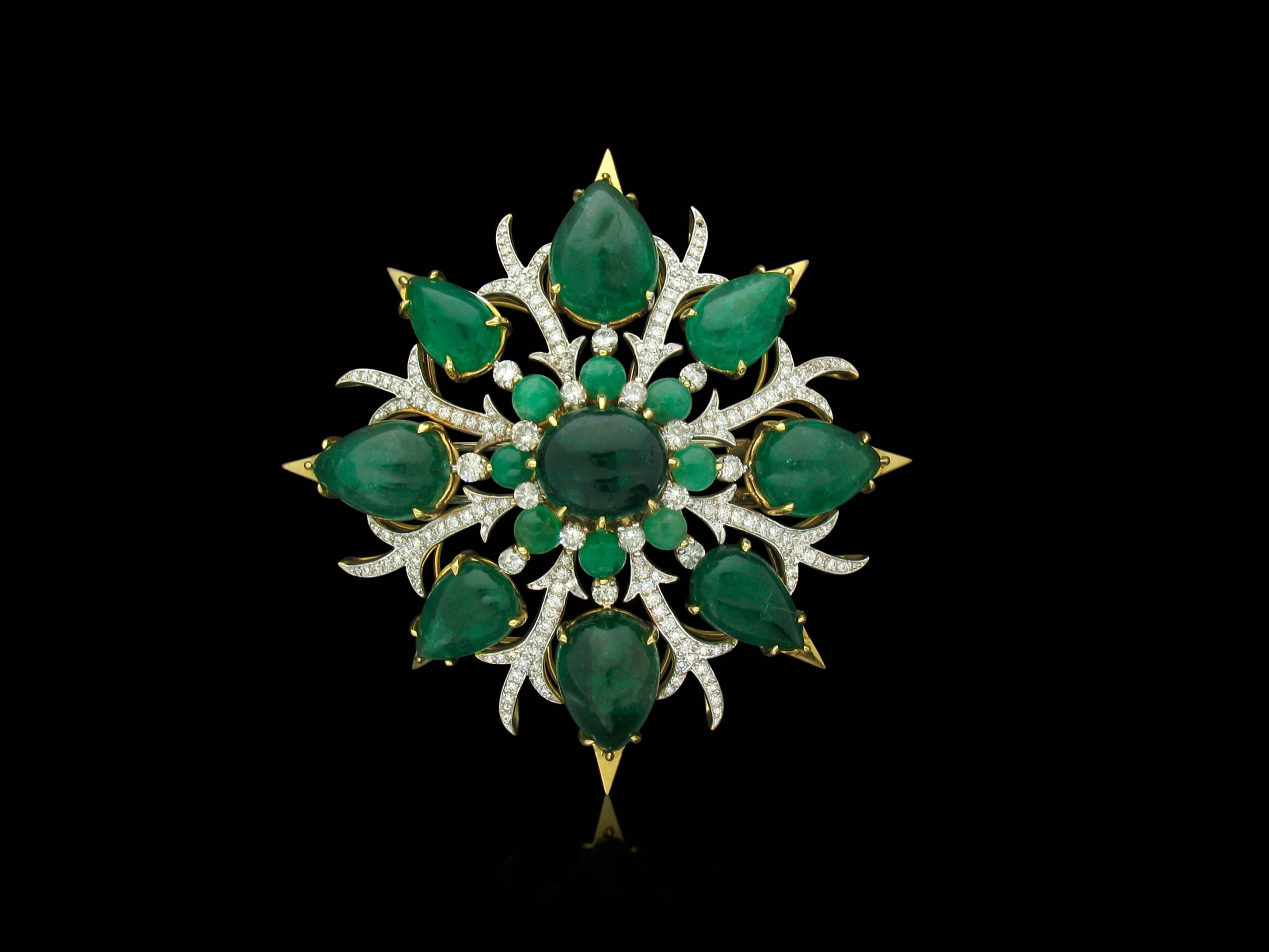 This exquisite Tony Duquette creation features eight Pear shaped, cabochon Emeralds, an Oval cabochon in the center surrounded by eight more round cabochons.  Together, they weigh 63 carats.  They are further accented by 3.74 carats in Diamond Pave.