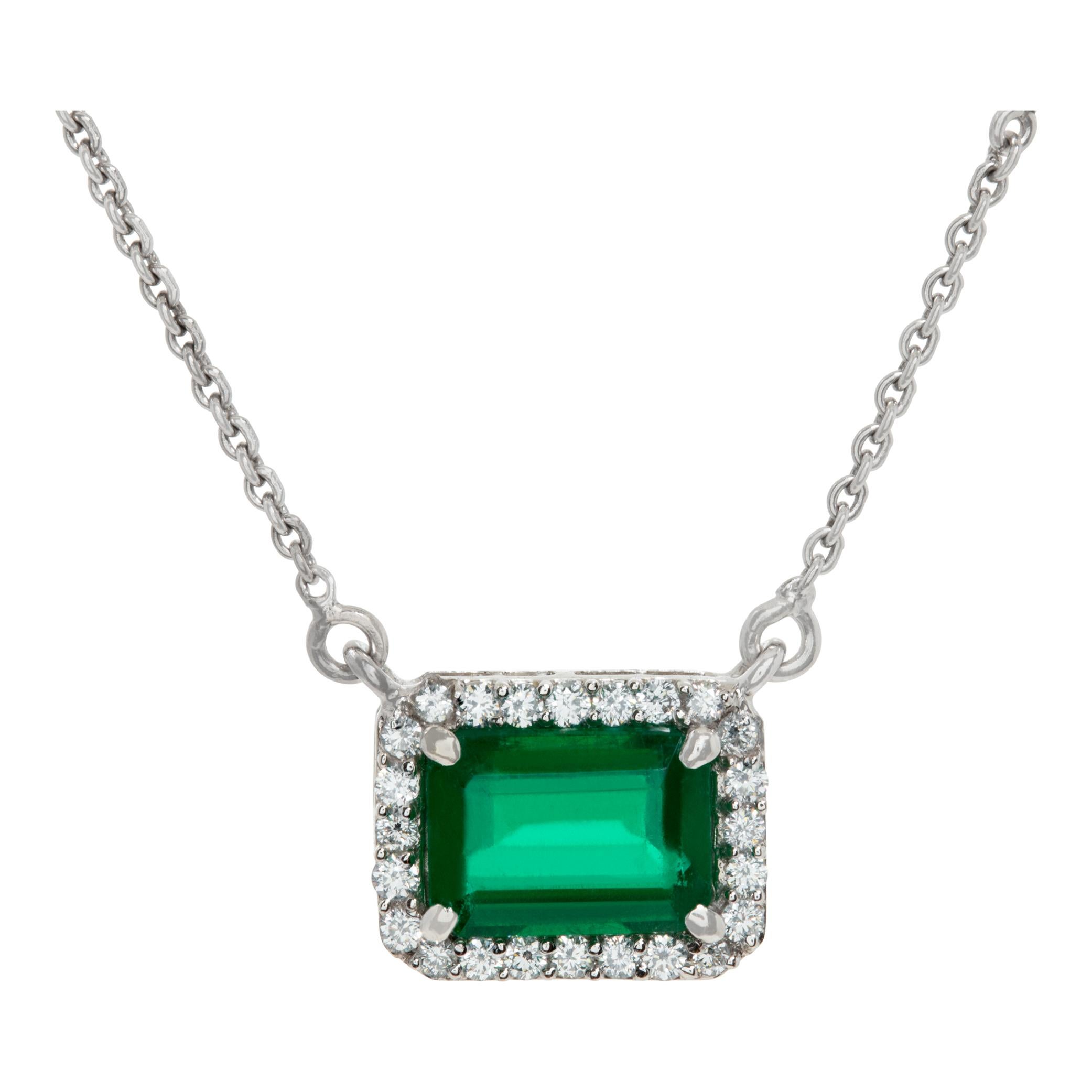 Emerald and diamonds chain necklace pendant set in 18k white gold. Cente emerald cut emerals approx. 4.00 carats. Round brilliant & pear shape cut diamonds  (on the chain) total approx. weight:  0.50 carat, estimate:G-H color, VS clarity. Size of