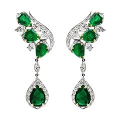 Boucles d'oreilles Chandelier en or blanc 18 carats avec émeraudes et diamants