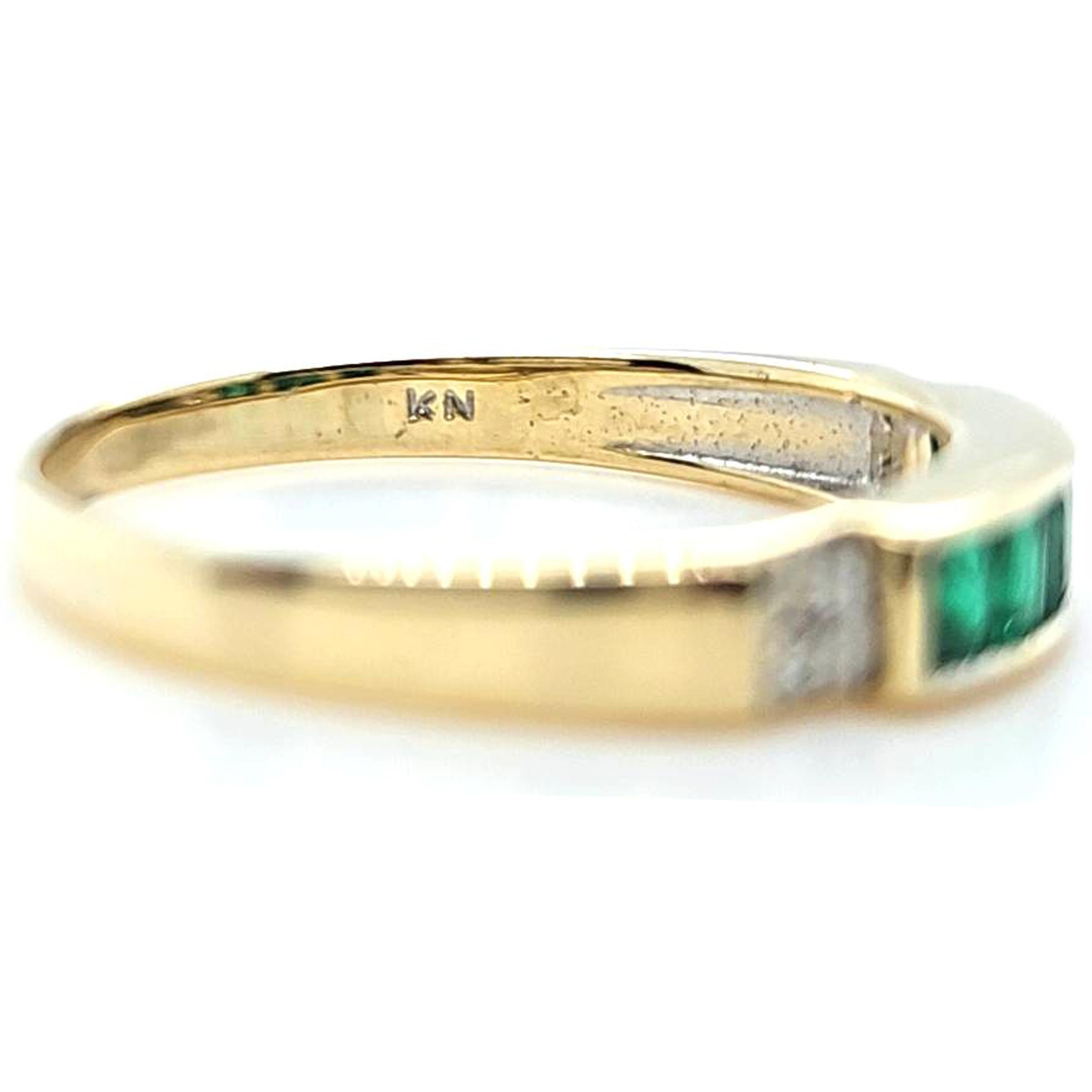 Women's Emerald and Diamond Channel Ring in Yellow Gold