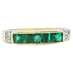 Smaragd- und Diamant-Kanalring aus Gelbgold