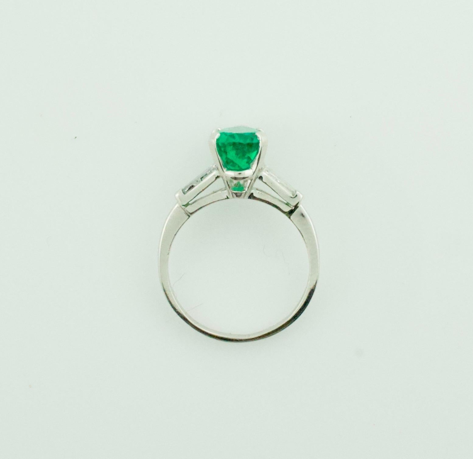 Emerald and Diamond Classic Solitaire Ring in Platinum
Elevate your style with this exquisite Emerald and Diamond Classic Solitaire Ring in Platinum. This stunning ring features a pear-shaped Colombian Emerald with a weight of 1.87 carats, certified