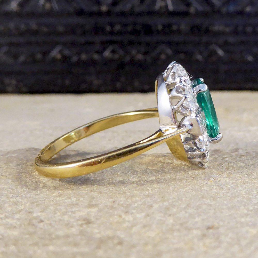 Contemporary Emerald and Diamond Cluster Engagement Ring For Sale