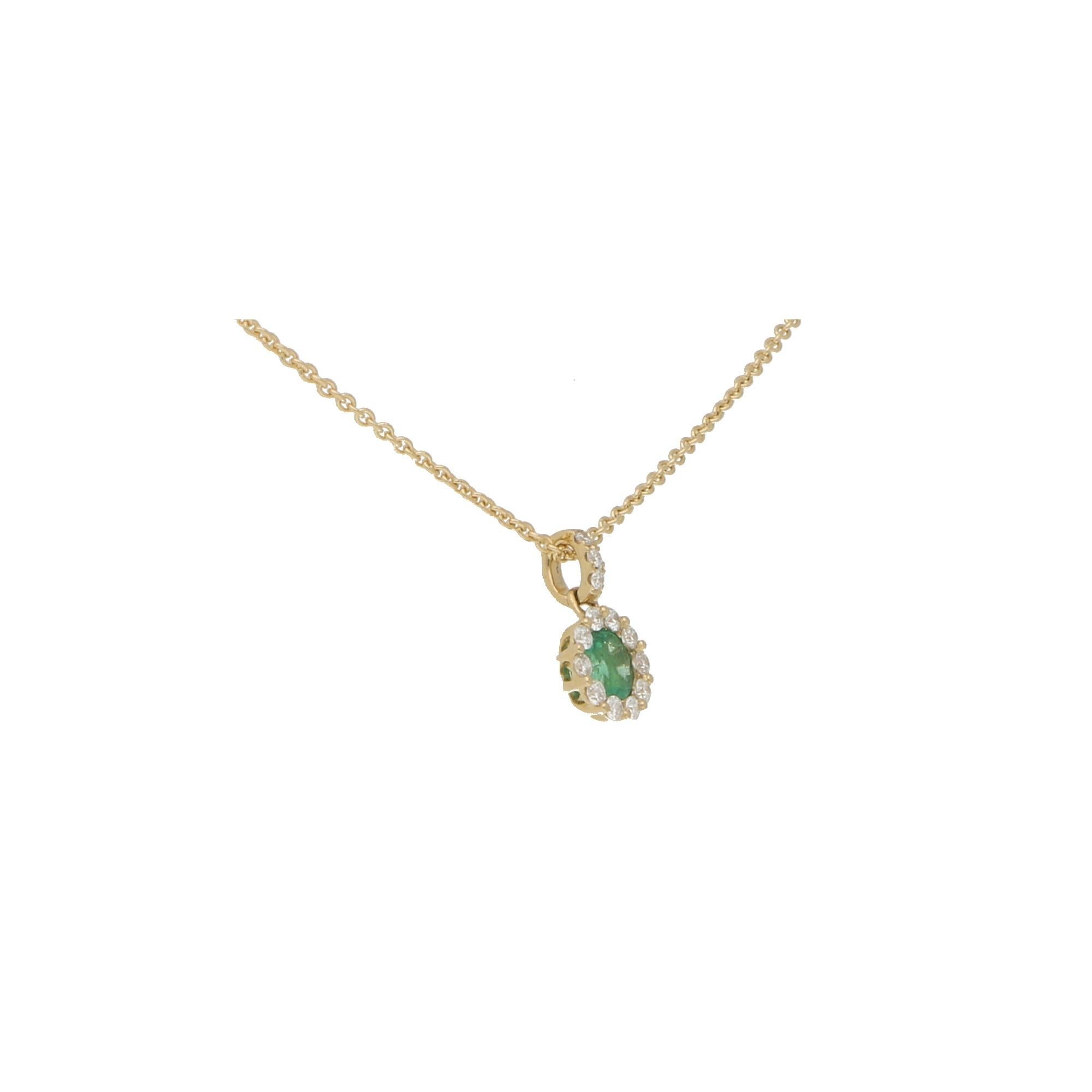 Round Cut Emerald and Diamond Cluster Pendant in 18 Karat Yellow Gold