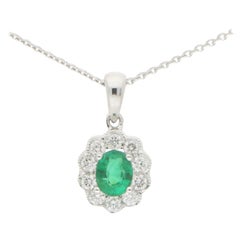 Emerald and Diamond Cluster Pendant Set in 18 Karat White Gold
