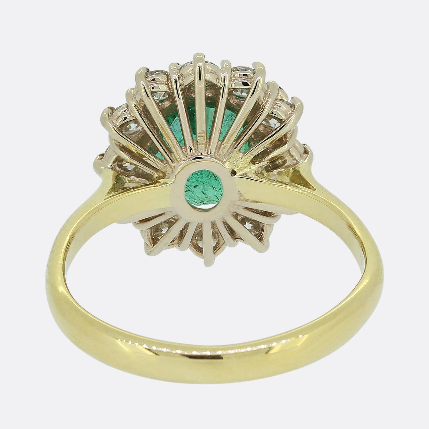 Oval Cut Emerald and Diamond Cluster Ring For Sale