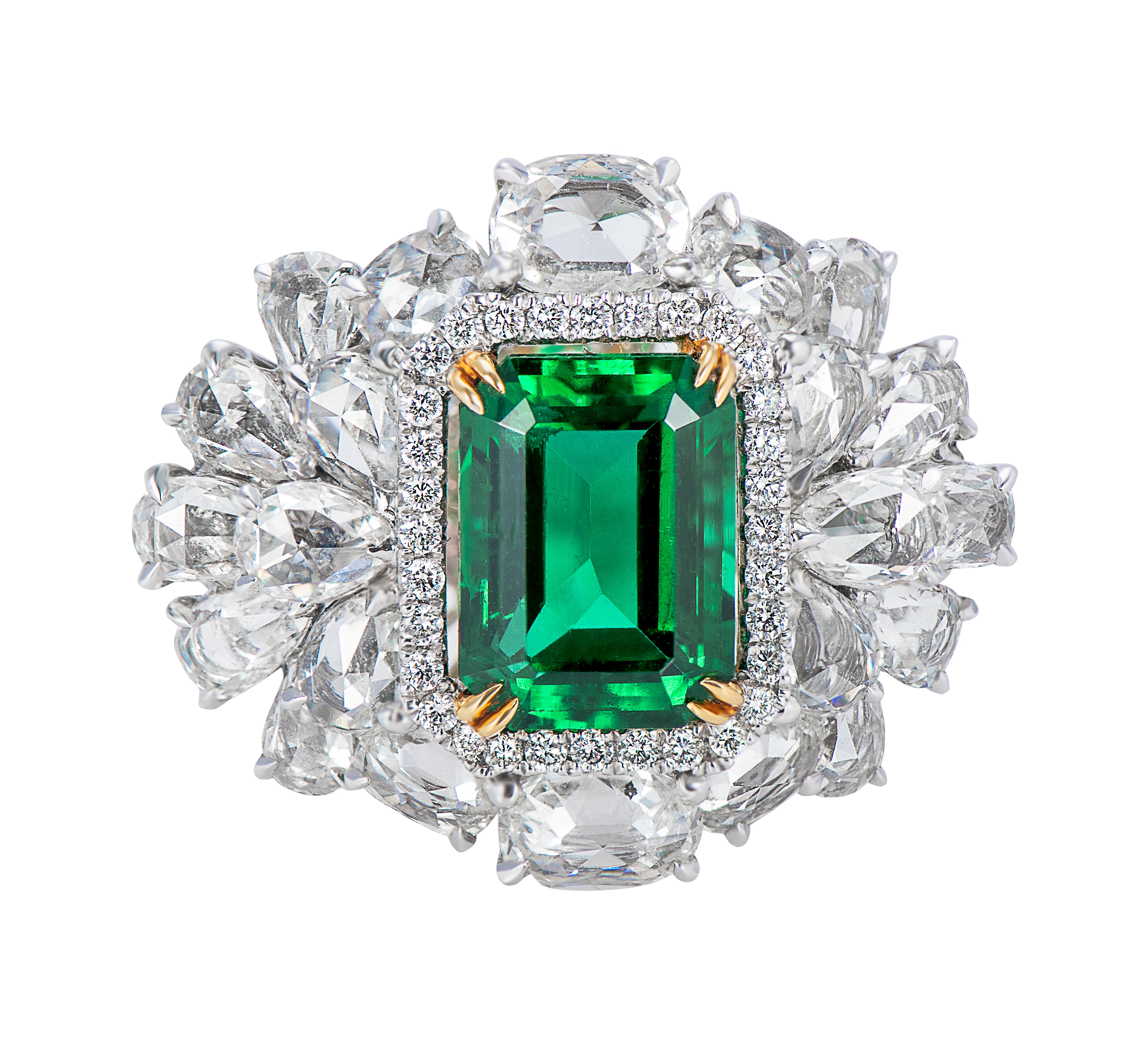Platinum and 18 karat yellow gold Emerald cocktail ring part of Laviere's Viridian collection. The ring is set with a 2.93 carat GRS certified octagon cut Emerald, surrounded by 3.5 carat of pear, oval, and brilliant round diamonds.
Gross Weight of