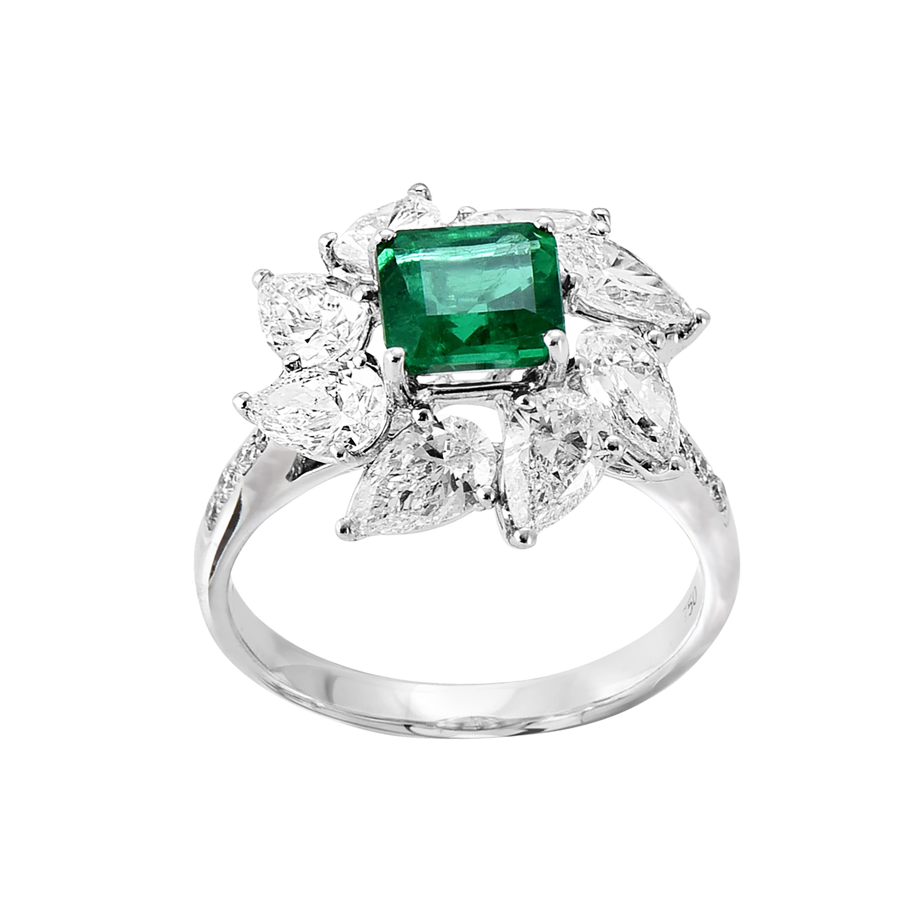 18 karat white gold emerald cocktail ring from the Viridian collection of Laviere. The ring, certified by IGI, is set with 1.28 carats emerald in the center, 2.14 pear shape brilliant-cut diamonds and 0.11 carats round brilliant diamonds.
Gold