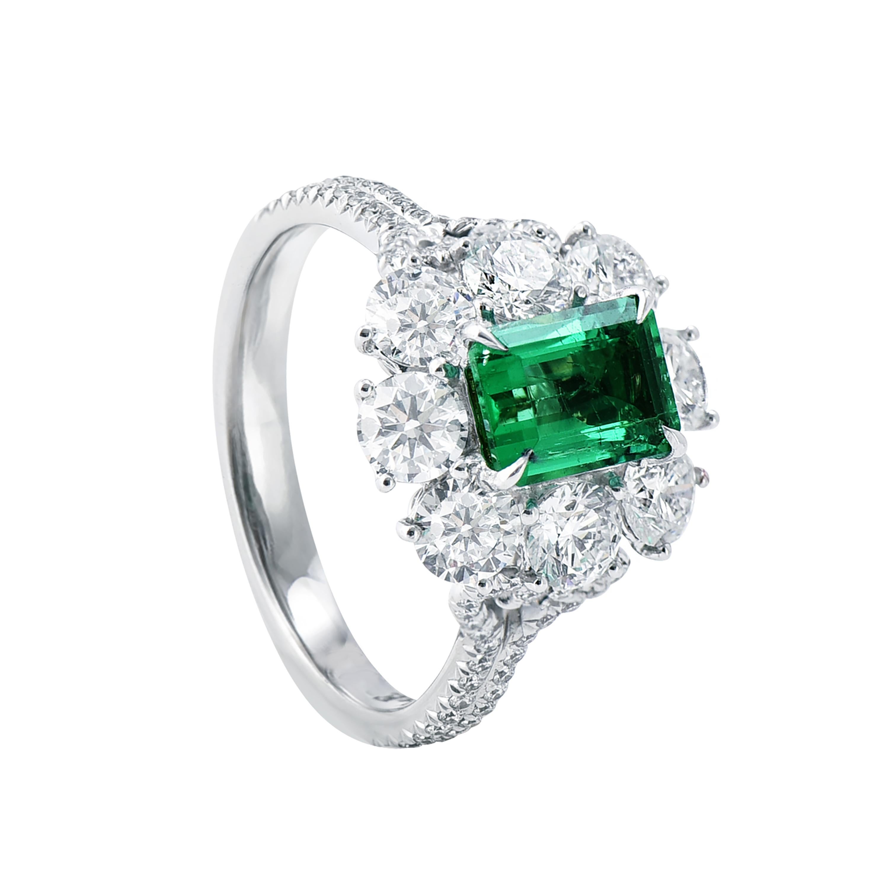 18 karat white gold emerald ring from the Viridian collection of Laviere. The ring, certified by IGI, is set with 1.21 carats emerald in the center and surrounded by 2.02 carats round brilliant diamonds. 
Gold Weight 5.66 grams. Diamond Clarity
