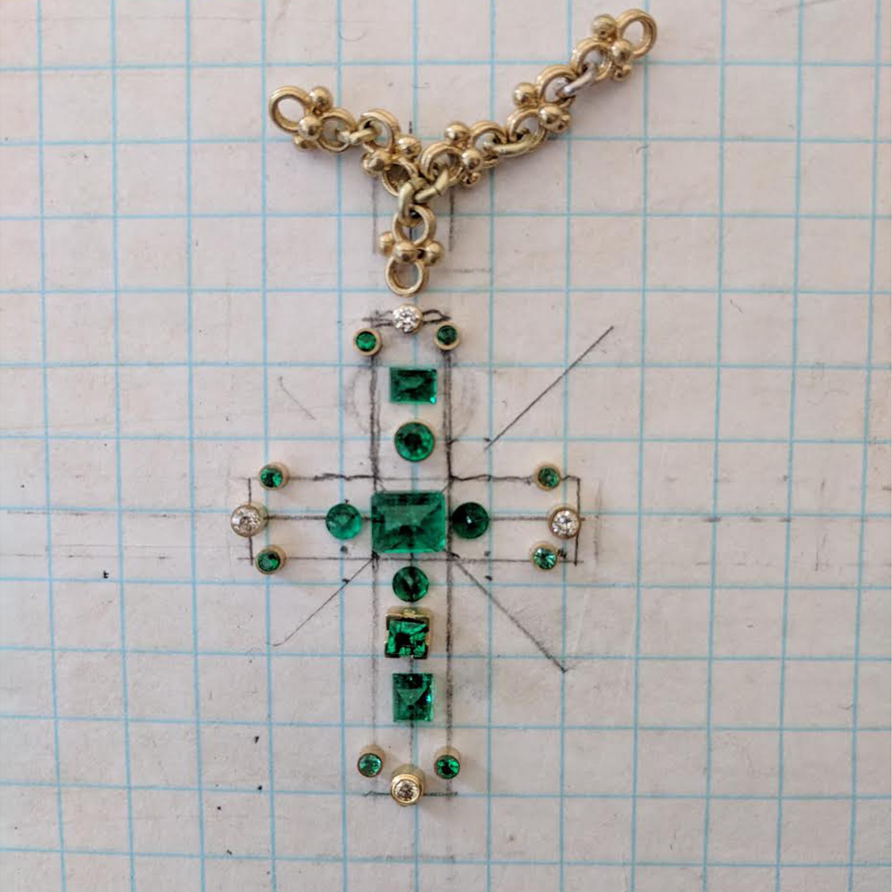 Emerald and Diamond Cross in 18k Gold with Handmade Celtic Chain. Every cross I make is different from the one previously executed. This cross was made with a collection of emeralds that became a finished piece after hours of execution. To balance