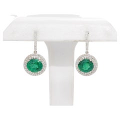 Emerald and Diamond Dangle Earrings in Platinum