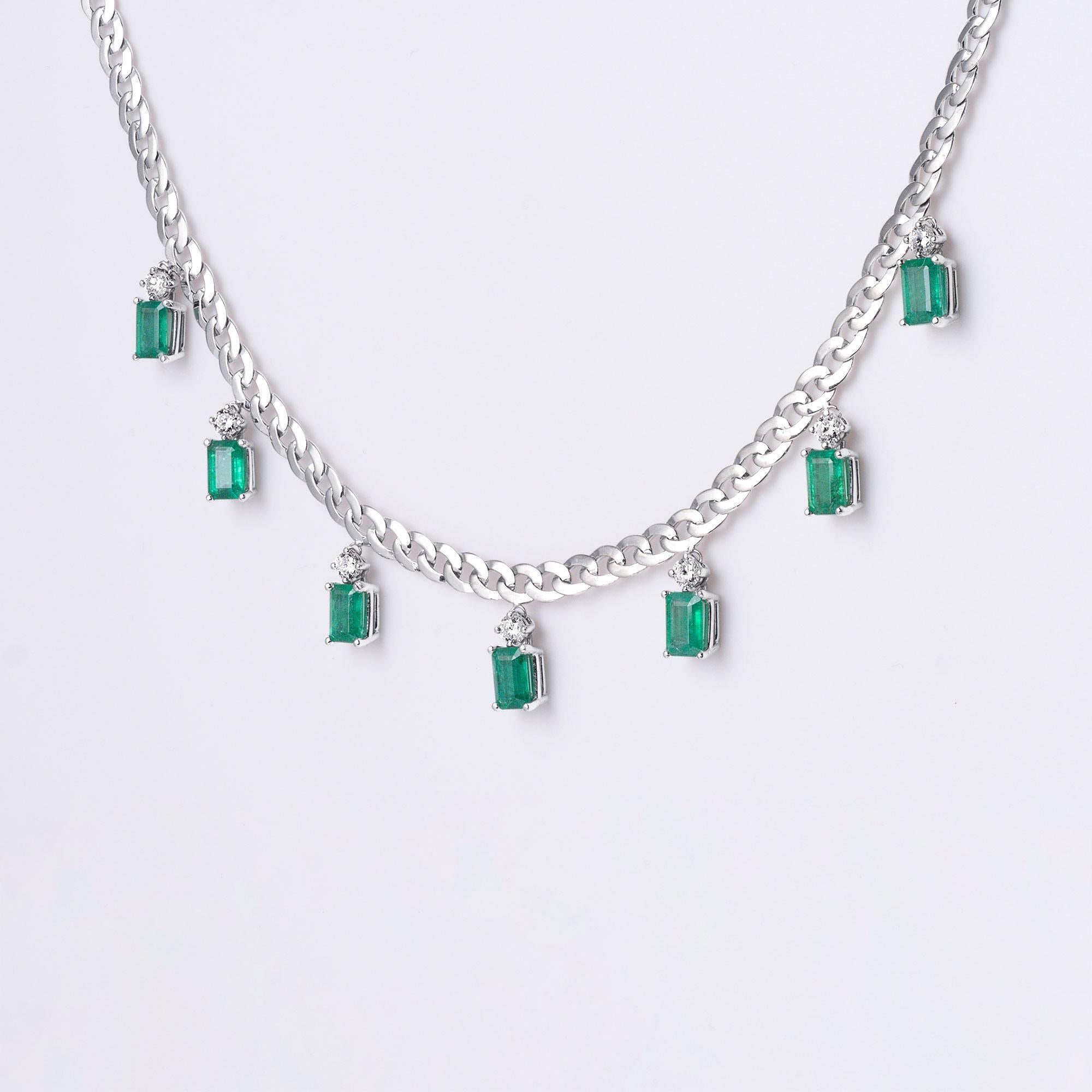 Modern Emerald and Diamond Dangle Necklace on 18k White Gold Cuban Link Chain For Sale