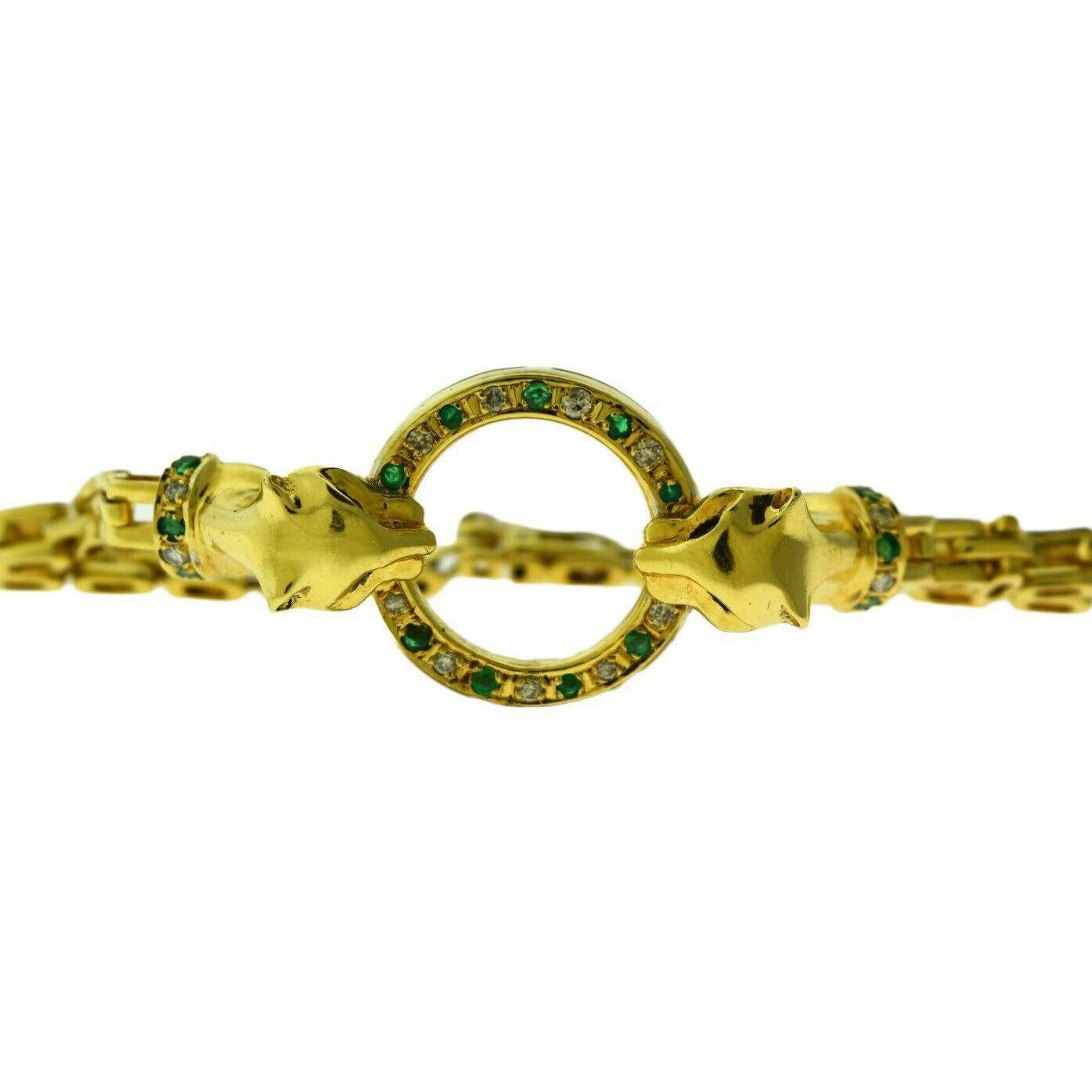 Emerald and Diamond Double Panther Head Circle Bracelet in 18 Karat Yellow Gold In Good Condition In Miami, FL