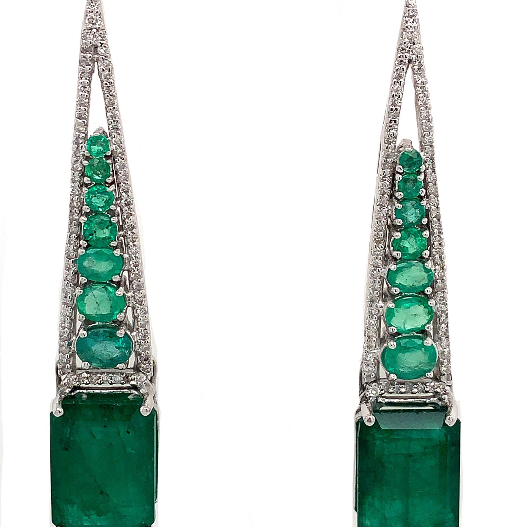 Green Lagoon Collection

Emerald and Diamond drop dangle earrings set in 18K white gold.

Emerald: 14.37ct total weight.
Diamonds: 1.09ct total weight.
All diamonds are G-H/SI stones.