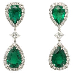 Boucles d'oreilles pendantes en émeraude et diamant 