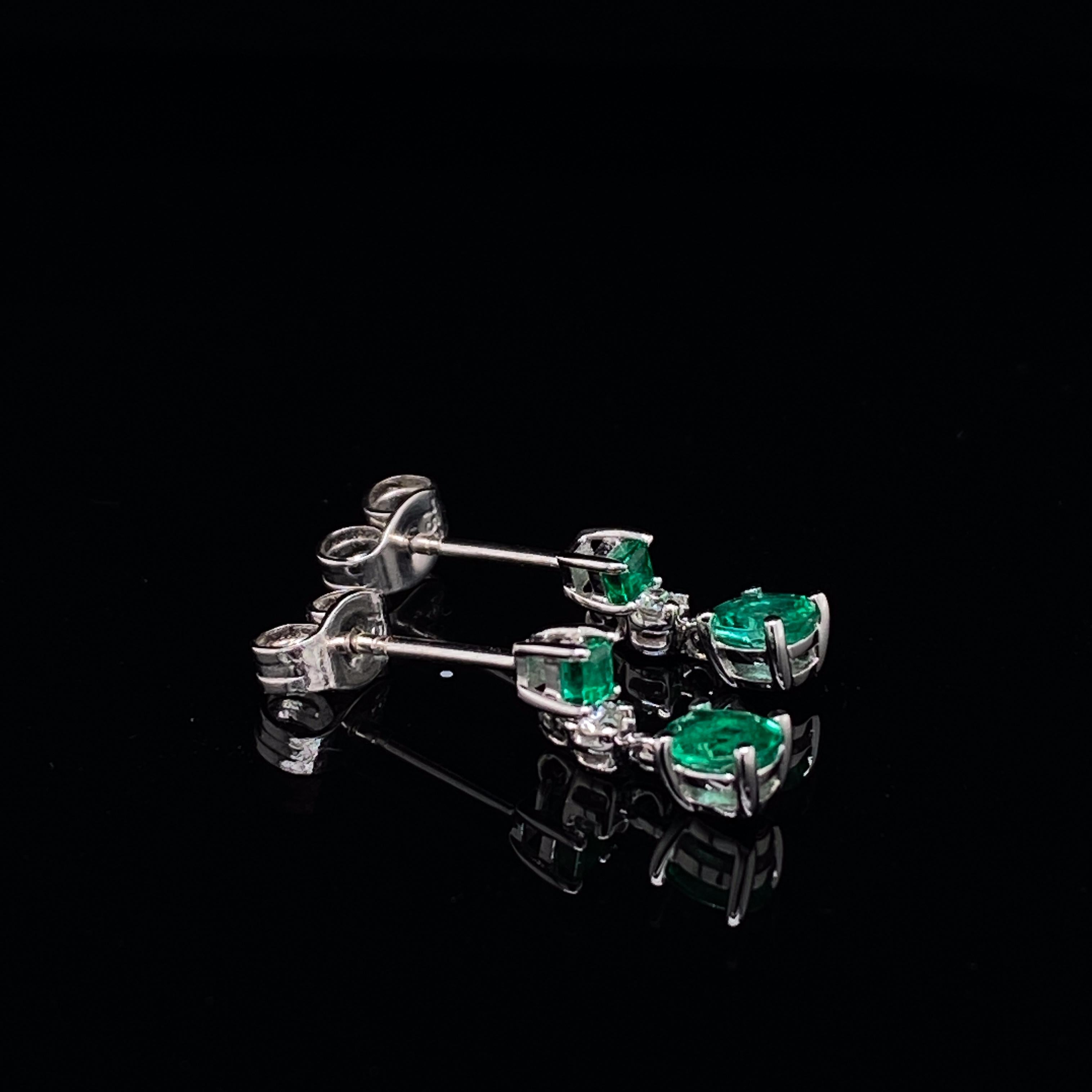 Emerald and diamond drop earrings in 18 karat white gold.

A beautiful little pair of emerald and diamond drop earrings set in 18 karat white gold. Each earring comprises of an alternating emerald, diamond and emerald terminating in a bright lively