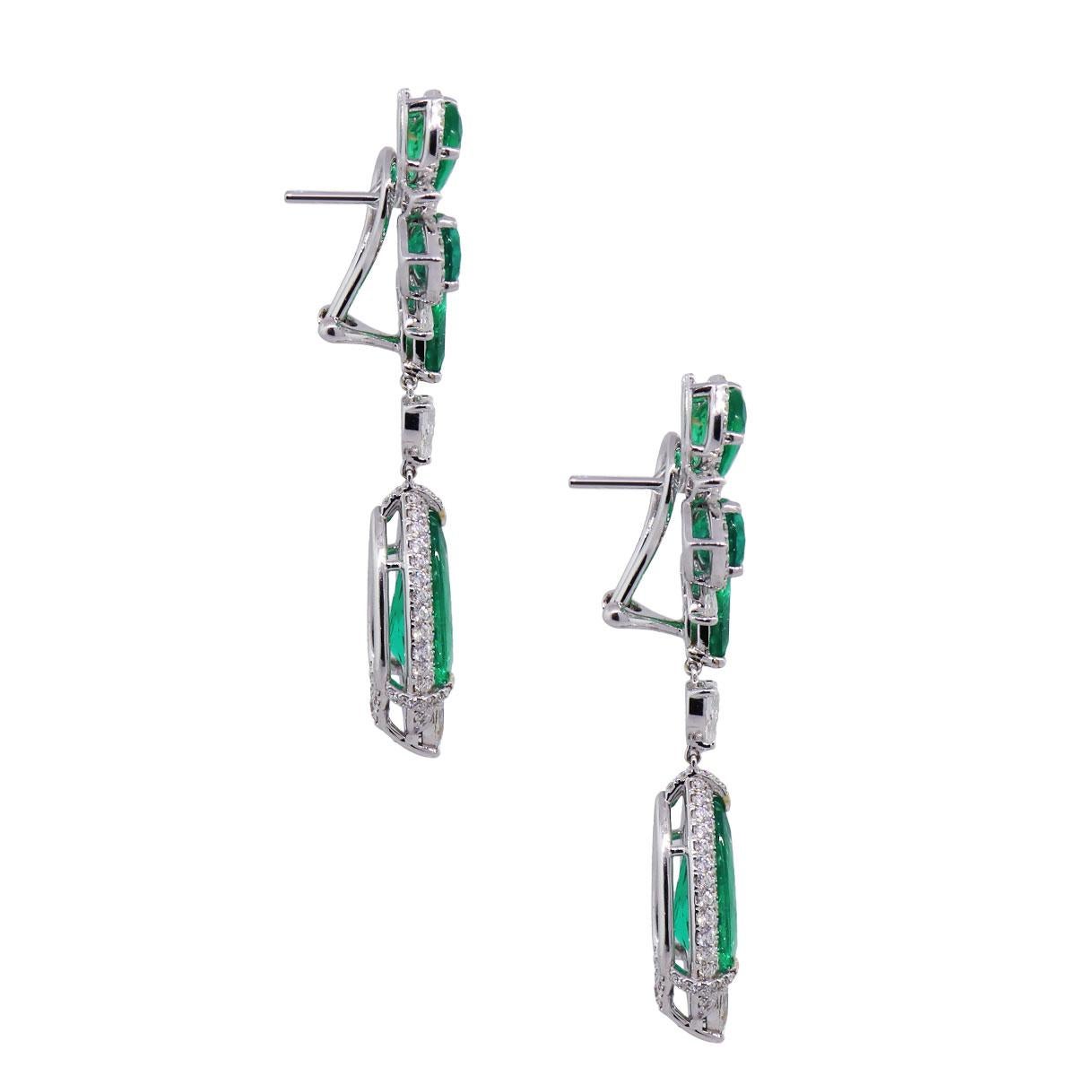 Material: 18k white gold
Diamond Details: Approximately 3.49ctw of Marquees shape, pear shape and round brilliant diamonds. Diamonds are G/H in color and VS in clarity
Gemstone Details: Approximately 10.72ctw of pear shape emeralds
Earring