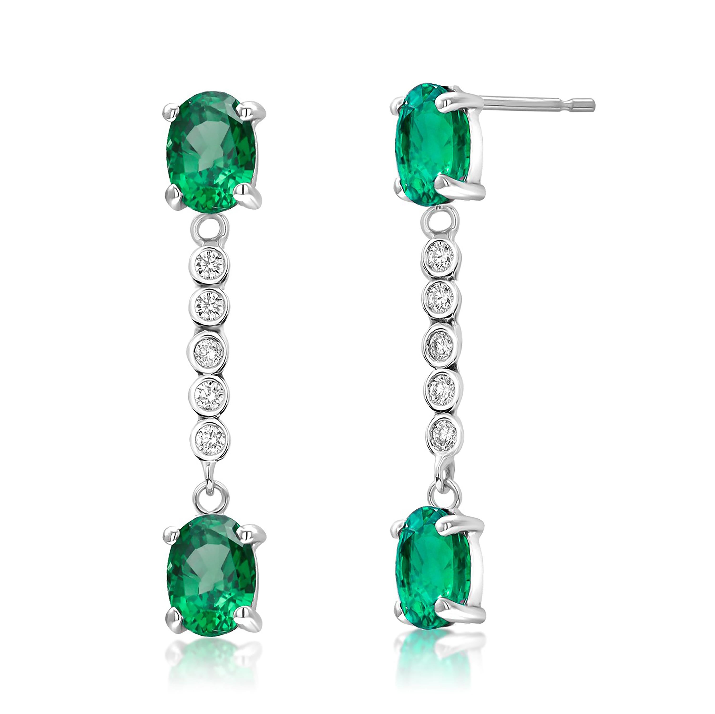 Oval Cut Emerald and Diamond Drop White Gold Drop Earrings