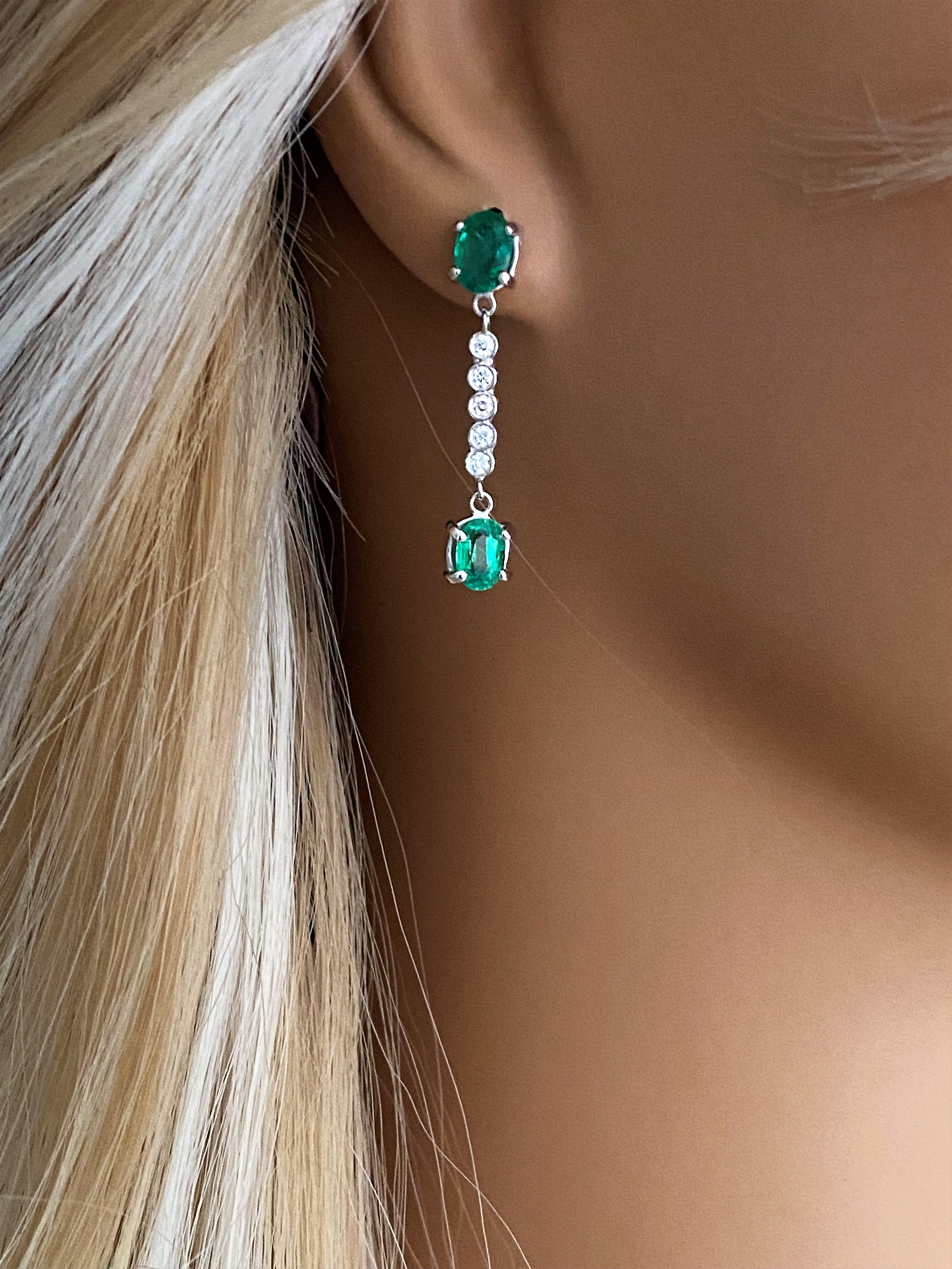 Contemporary Emerald and Diamond Drop White Gold Drop Earrings