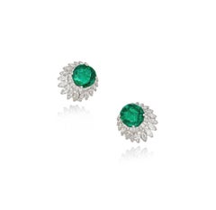 Emerald and Diamond Ear Clips in Platinum, By HARRY WINSTON.
