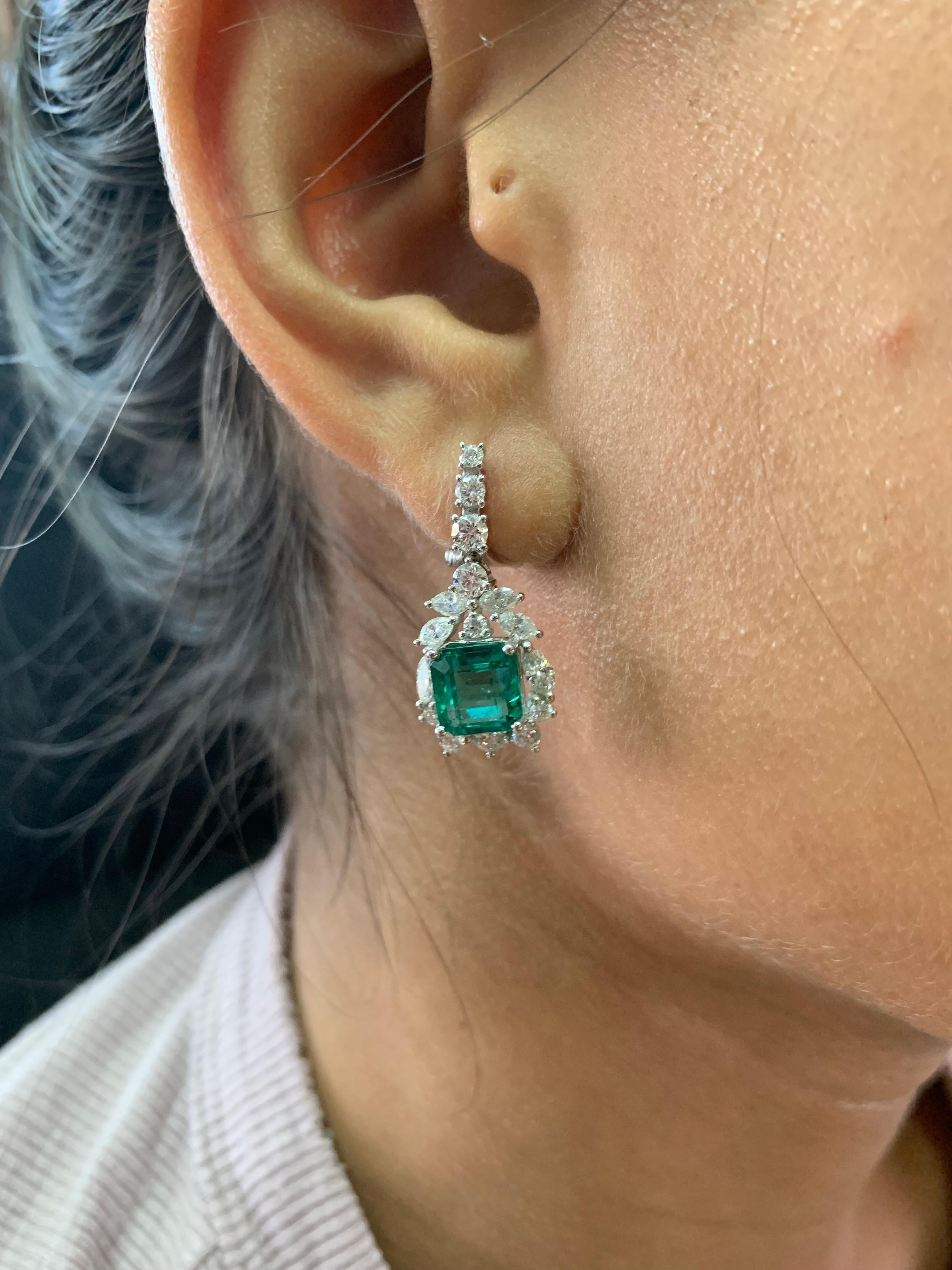 Classic rings with precious gemstones. We present a collection of everyday jewelry with emeralds that are accented with diamonds. These are gorgeous bridal and engagement ring/earrings to give to your loved one. 

Designer Zambian emerald earring in