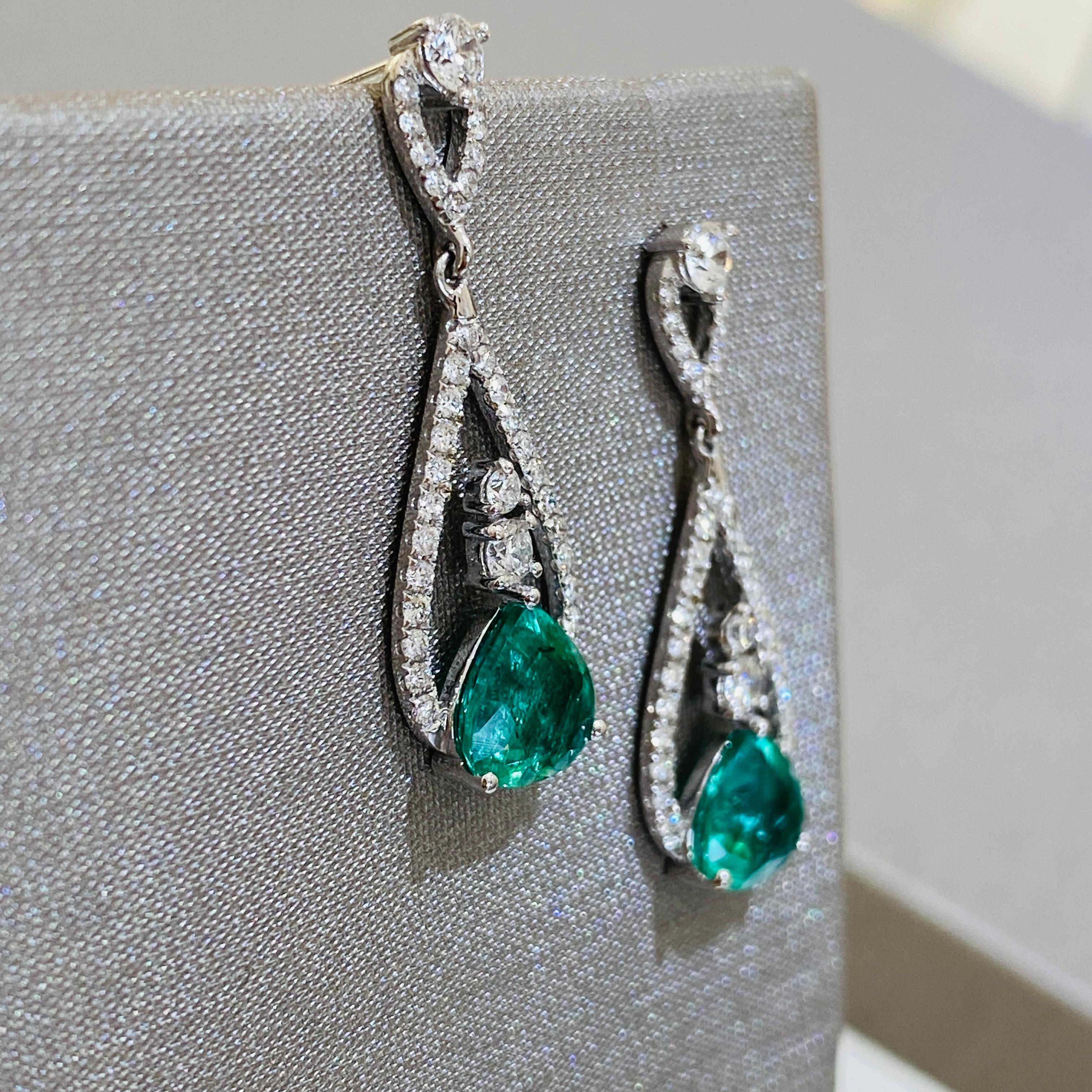Tresor Diamond Earring features 0.70 cts diamond and 2.04 cts emerald in 18k white gold. The Earring are an ode to the luxurious yet classic beauty with sparkly diamonds. Their contemporary and modern design makes them versatile in their use. The