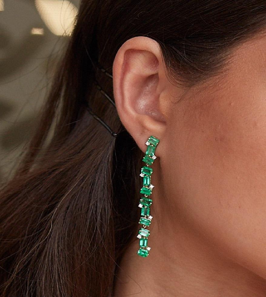 Tresor Earring features 0.22 cts diamond and 4.38 cts emerald in 18k yellow gold. The Earring are an ode to the luxurious yet classic beauty with sparkly diamonds. Their contemporary and modern design makes them versatile in their use. The earrings