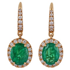  5.15 CaratZambian Emerald and Diamond Earring Studded in 18 Karat Yellow Gold