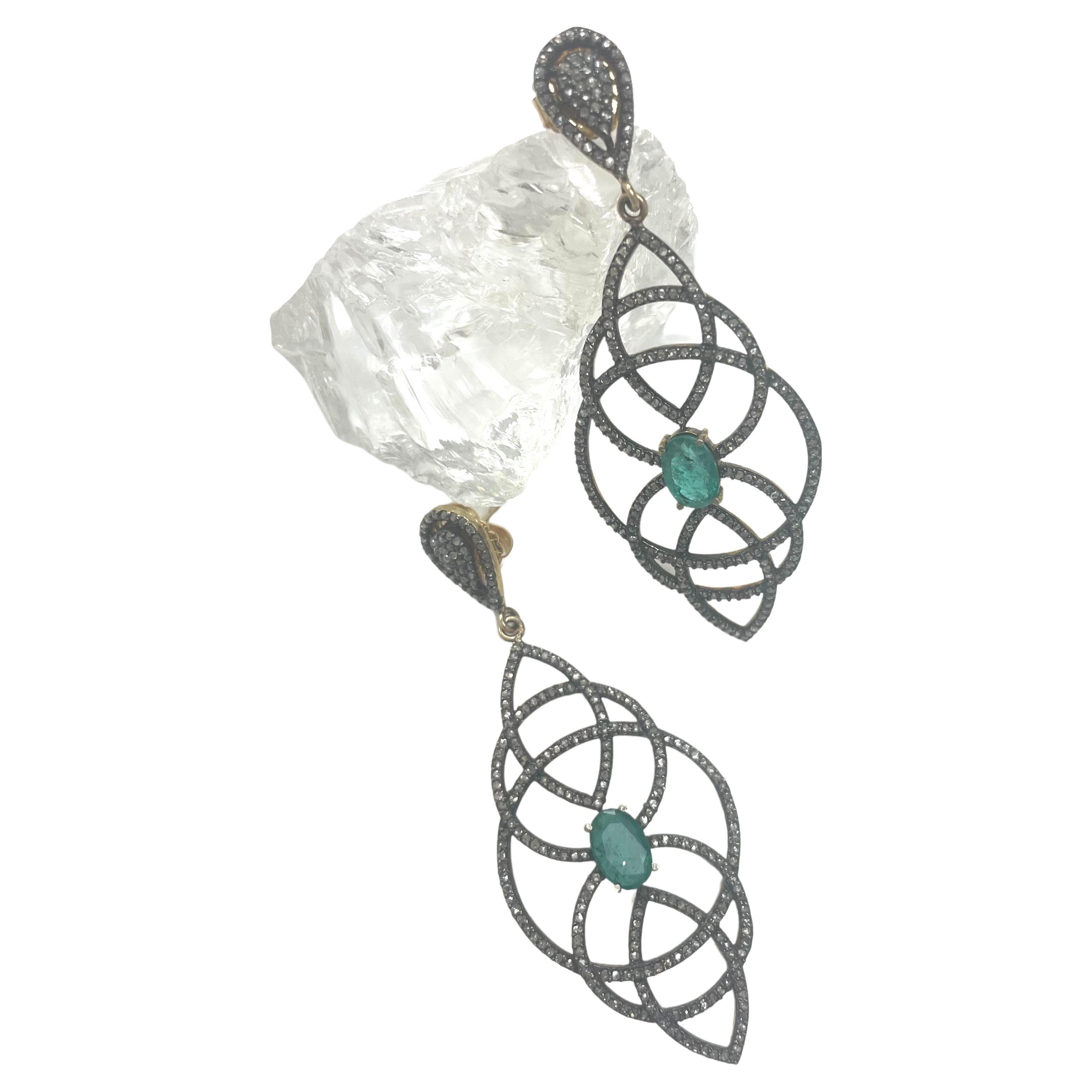 Description
Feminine and fashionable earrings with a stunning, faceted oval emerald centerpiece surrounded by lacy like pave diamonds.
Item #E3166

Materials and Weight
Emeralds, 2.66 carats, 6x9mm, faceted oval cut
Pave diamonds
