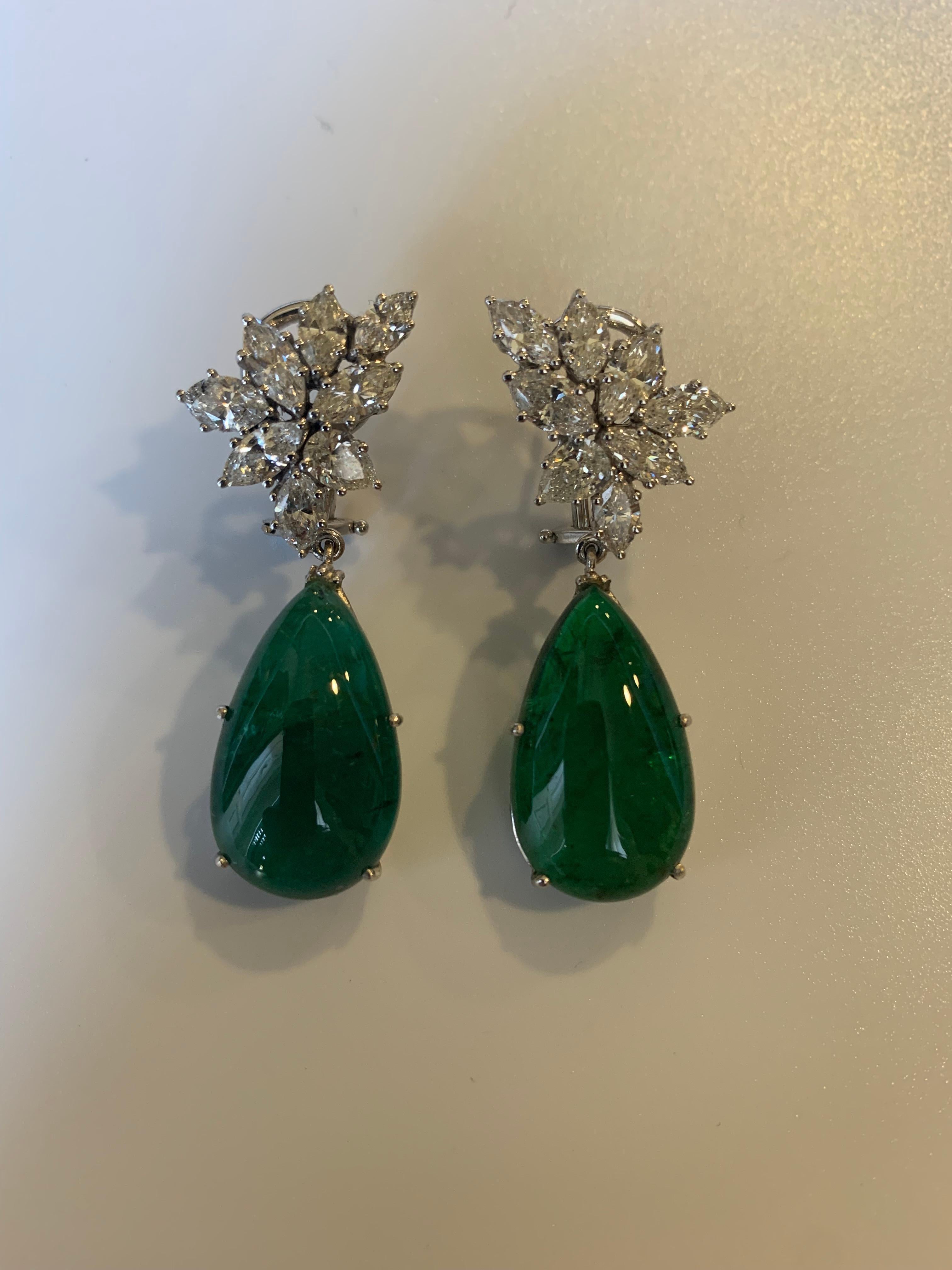 Cabouchon pear cut emerald earrings, Zambian origin, weighing 31.66 ct. and Marquise and pear cut diamonds weighing 4.99 ct. Made in 18K white gold weighing 10.57 gr.

Product Details
↣ Jewelry Type - Earrings
↣ Style - Classic
↣ Jewelry Main