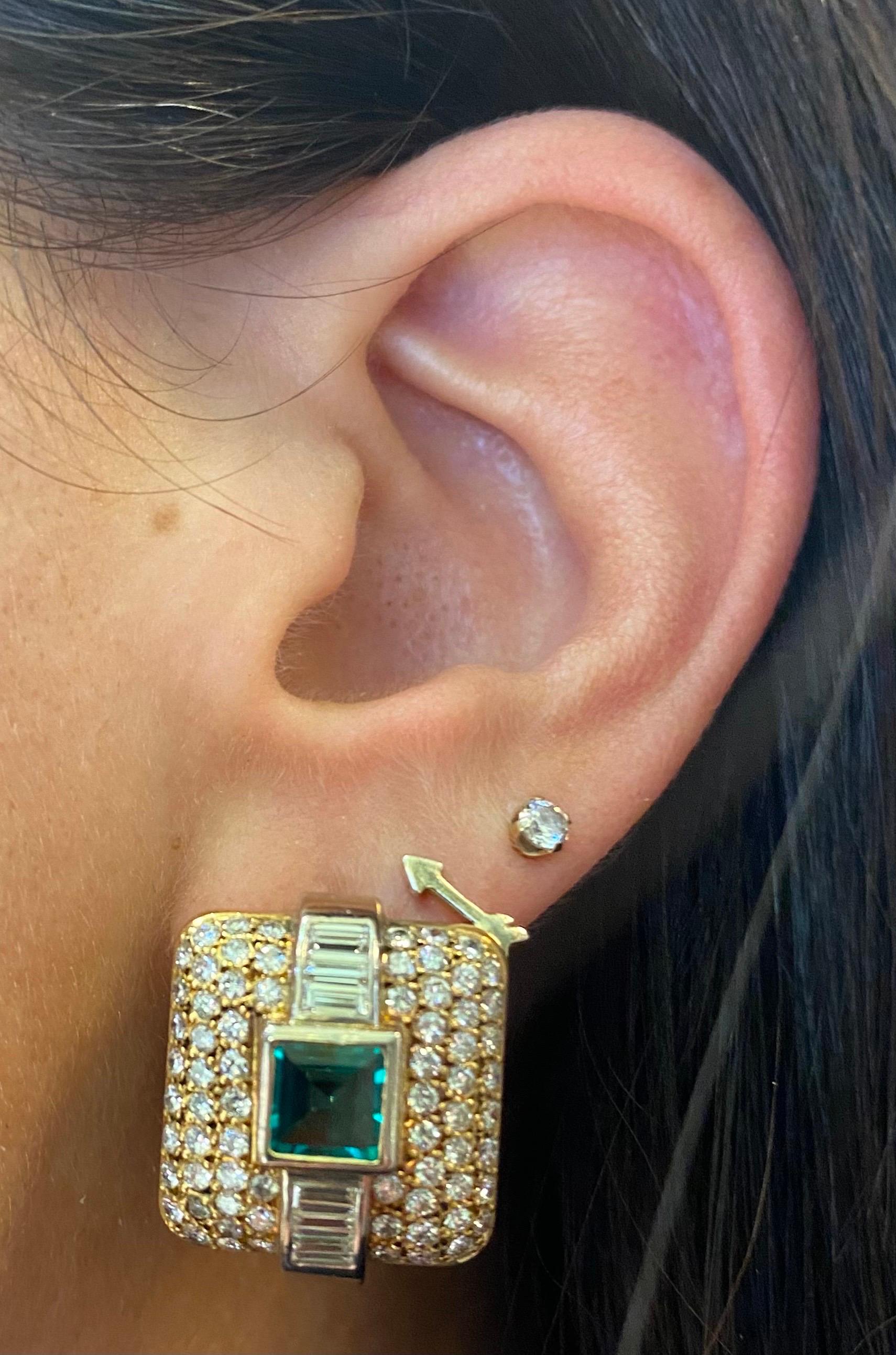 Emerald and Diamond Earrings

Square earrings set with square cut emeralds in the center and adorned with round and baguette-cut diamonds

Approximate Diamond Weight: 3.3 Carats
Approximate Emerald Weight: 1.24 carats
Back type: clip-on with