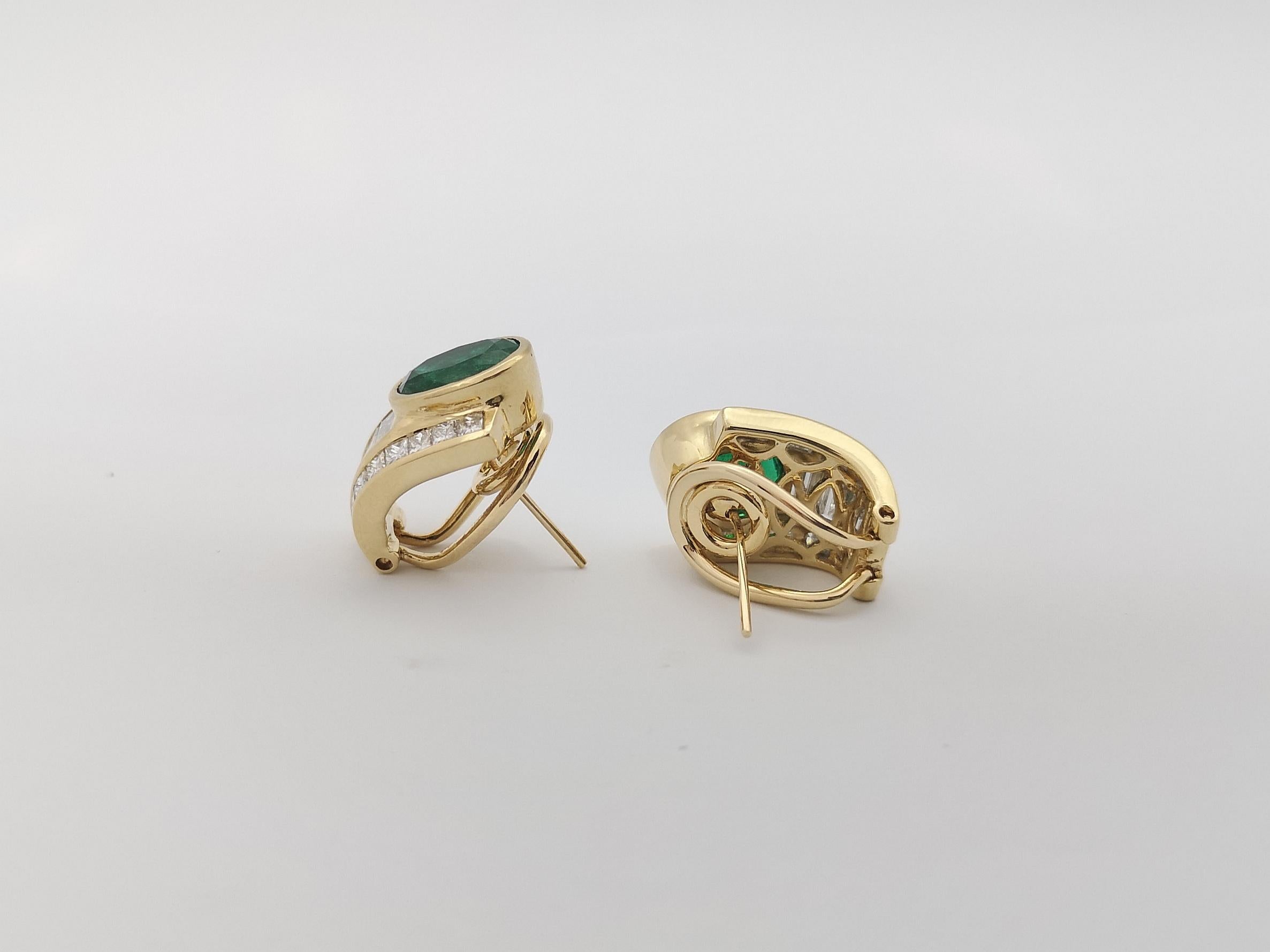 Women's Emerald and Diamond Earrings set in 18K Gold Settings For Sale