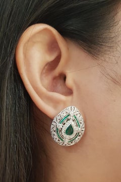 Emerald and Diamond Earrings set in 18K White Gold Settings