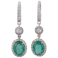 Emerald and Diamond Earrings Studded in 18 Karat White Gold