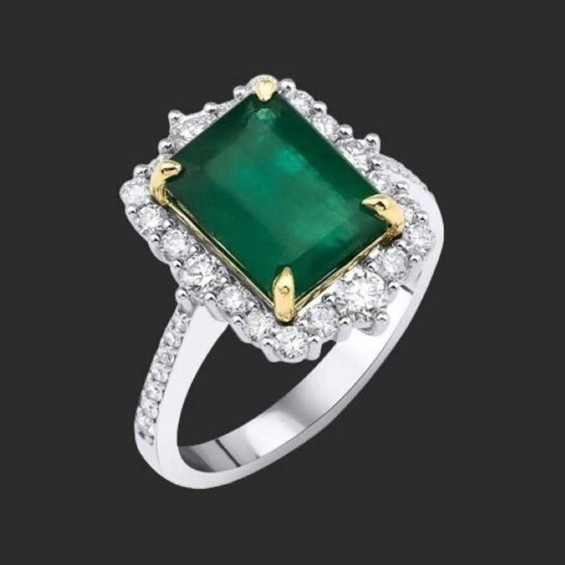 Einzelheiten zum Produkt :

- • Auf Bestellung gefertigt

- • Gold Kt: 14kt

- • Verfügbare Goldfarben: Roségold, Gelbgold, Weißgold

- • 0,61ct Natürlicher runder Diamant

- • 3,27ct Natürlicher Smaragd

- • Diamant Farbe-Klarheit: F-G Farbe VS/SI