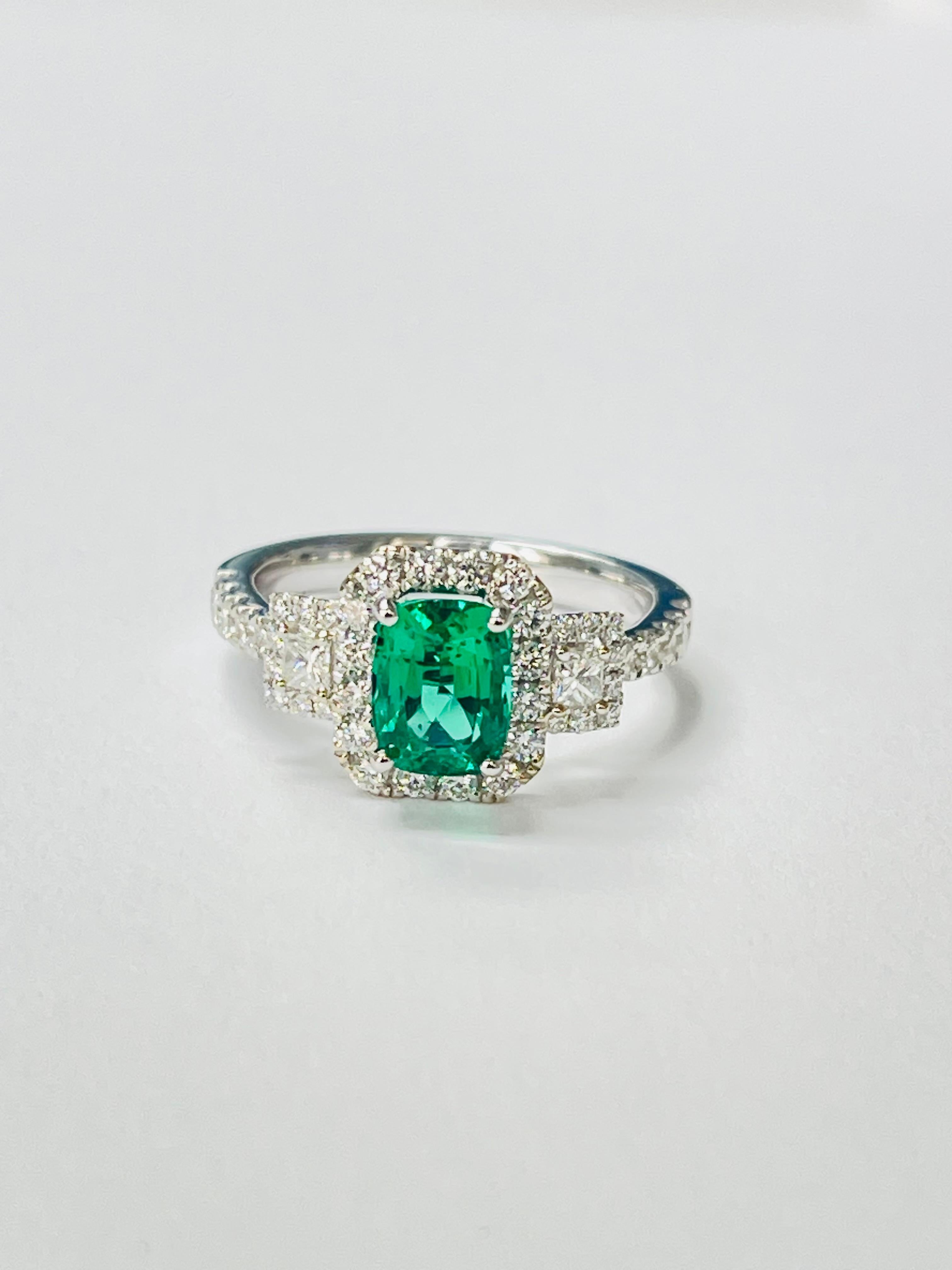 Contemporary Emerald and Diamond Engagement Ring In 18K White Gold. For Sale