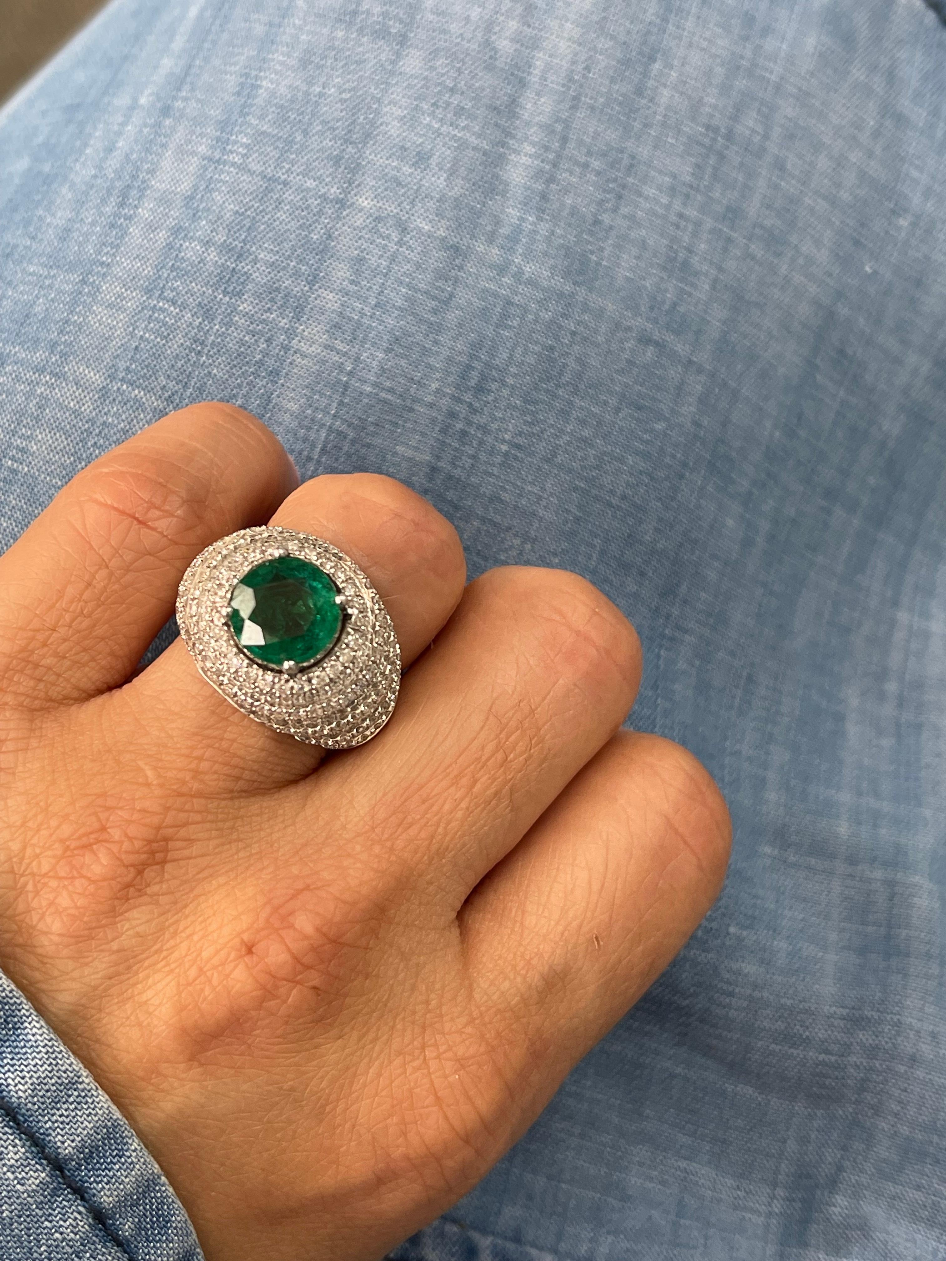 Women's Emerald And Diamond Engagement Ring In 18K White Gold. For Sale
