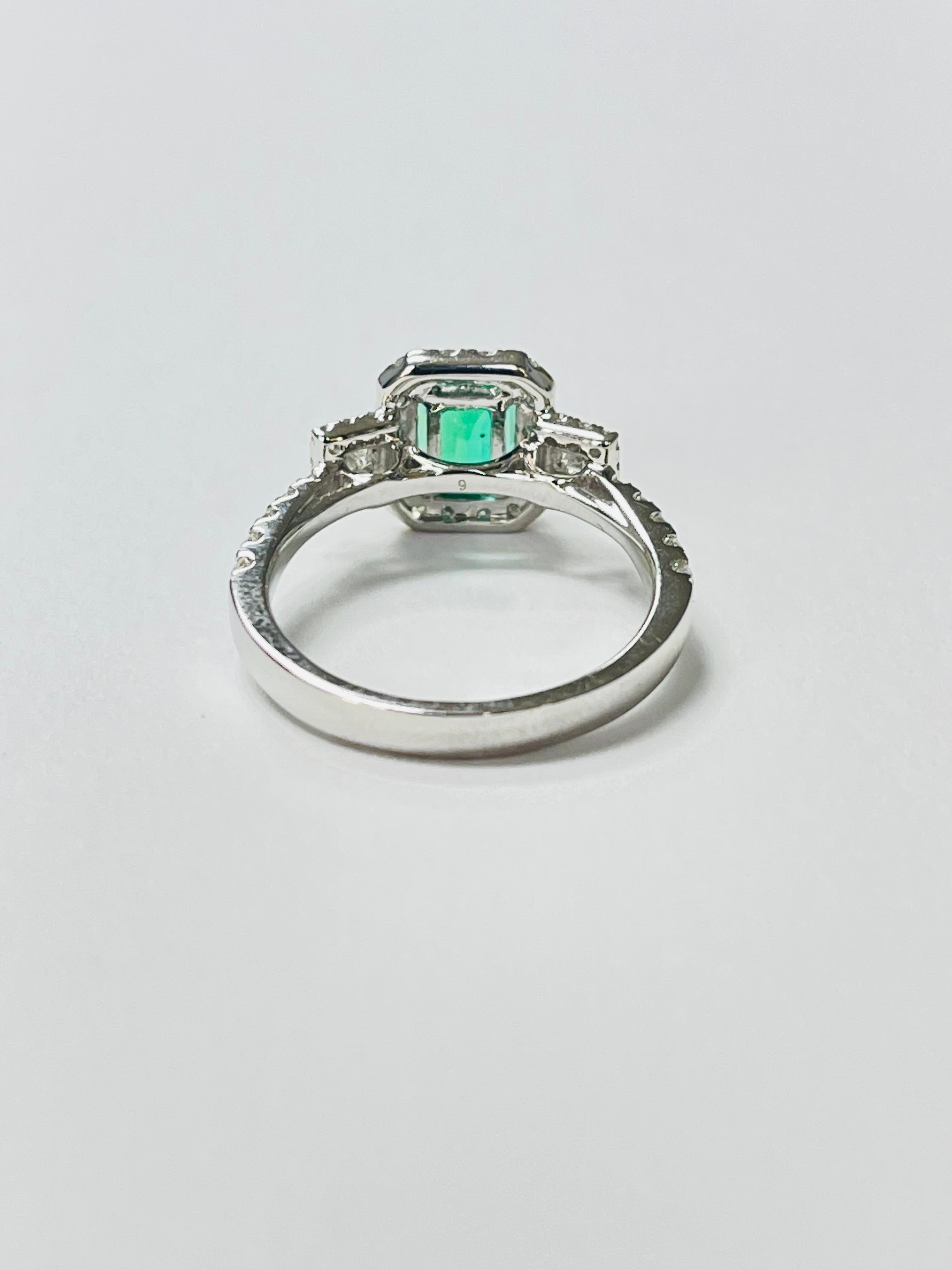 Women's Emerald and Diamond Engagement Ring In 18K White Gold. For Sale