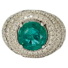 Emerald And Diamond Engagement Ring In 18K White Gold. 