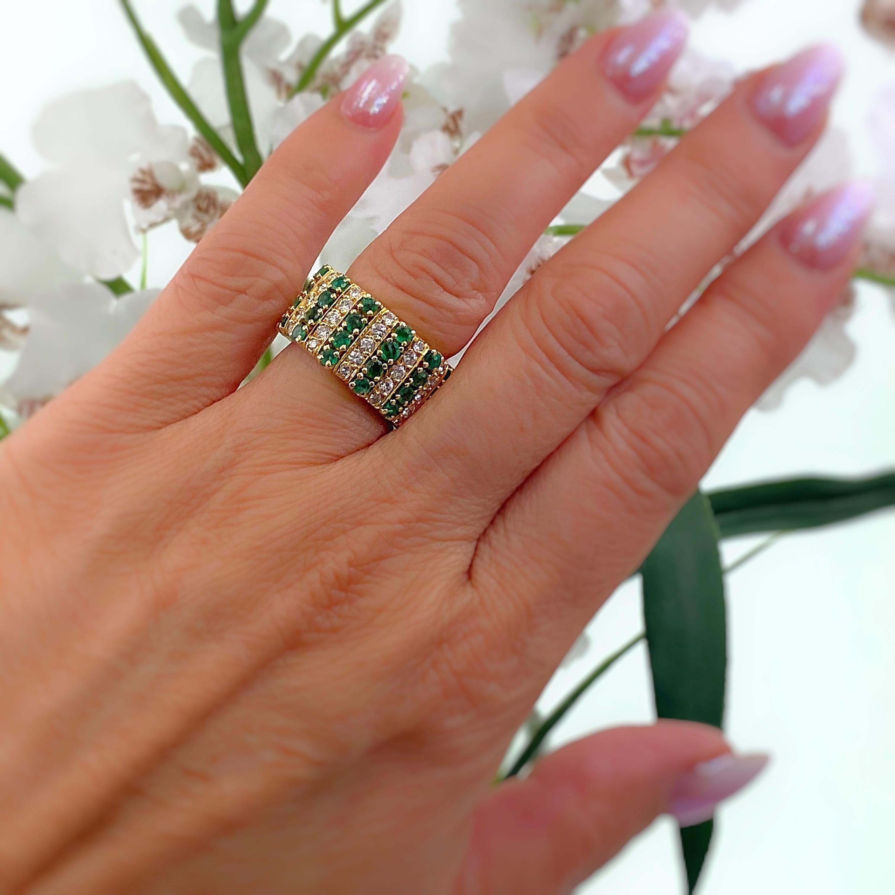 Emerald & Diamond Ring
Style: Wide Eternity Band
Metal:  18K Yellow Gold, 10.42 grams
Size / Measurements:  Ring size 5,  10.5 mm wide
TCW:  4.10 Carats Total
Emeralds:  48 Round Natural Emeralds, 2.50 Carats
Diamonds:  60 Round Brilliant, 1.60