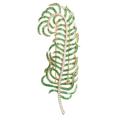 Emerald and Diamond Feather Brooch set in 18K Rose Gold Settings