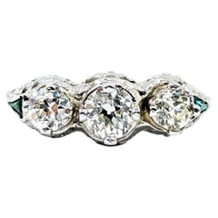 Bague filigrane en or blanc 18k avec émeraudes et diamants