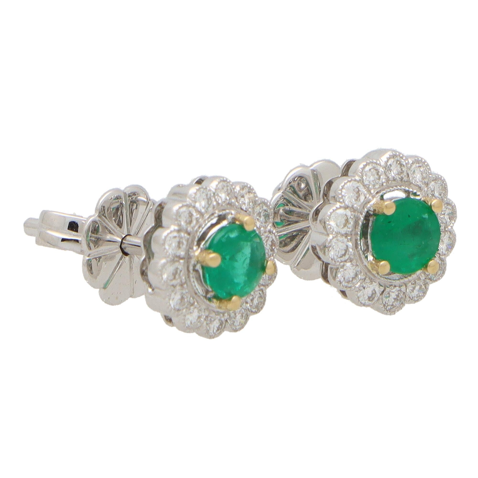 Round Cut Emerald and Diamond Floral Cluster Earrings Set in 18k White Gold For Sale